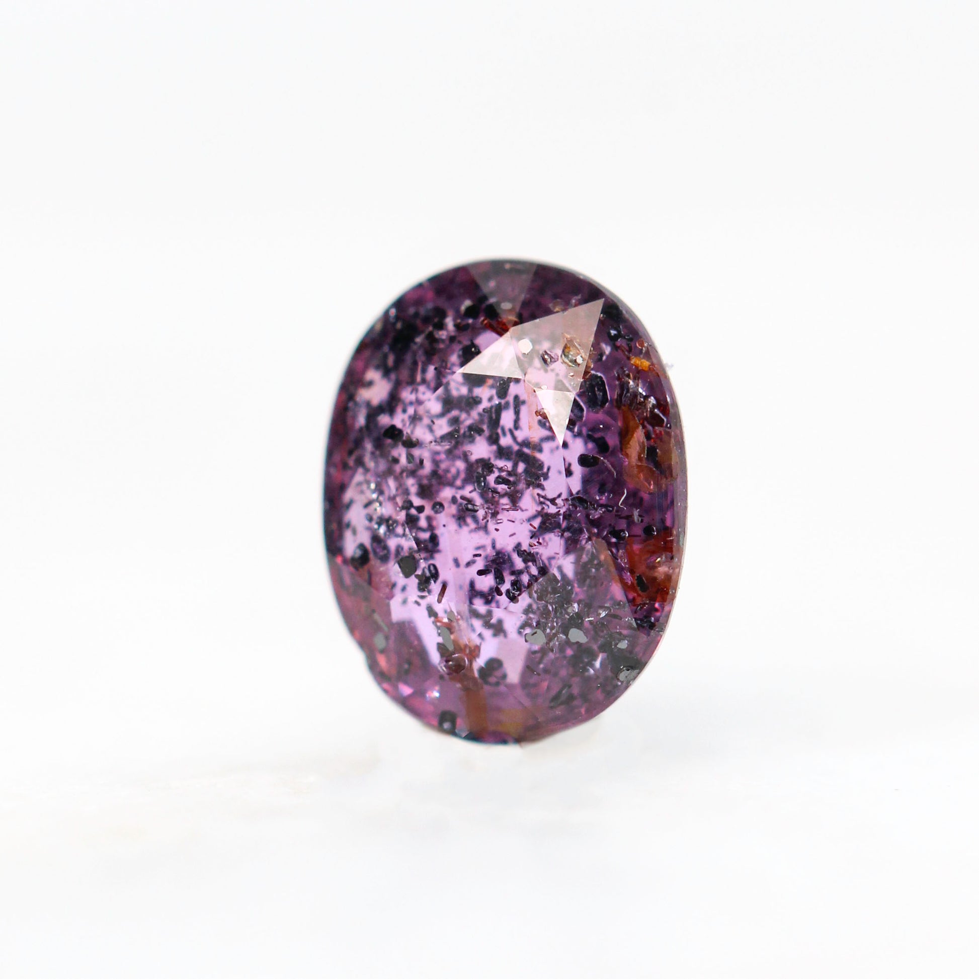 0.84 Carat Purple-Red Oval Ruby for Custom Work - Inventory Code PROR084 - Midwinter Co. Alternative Bridal Rings and Modern Fine Jewelry