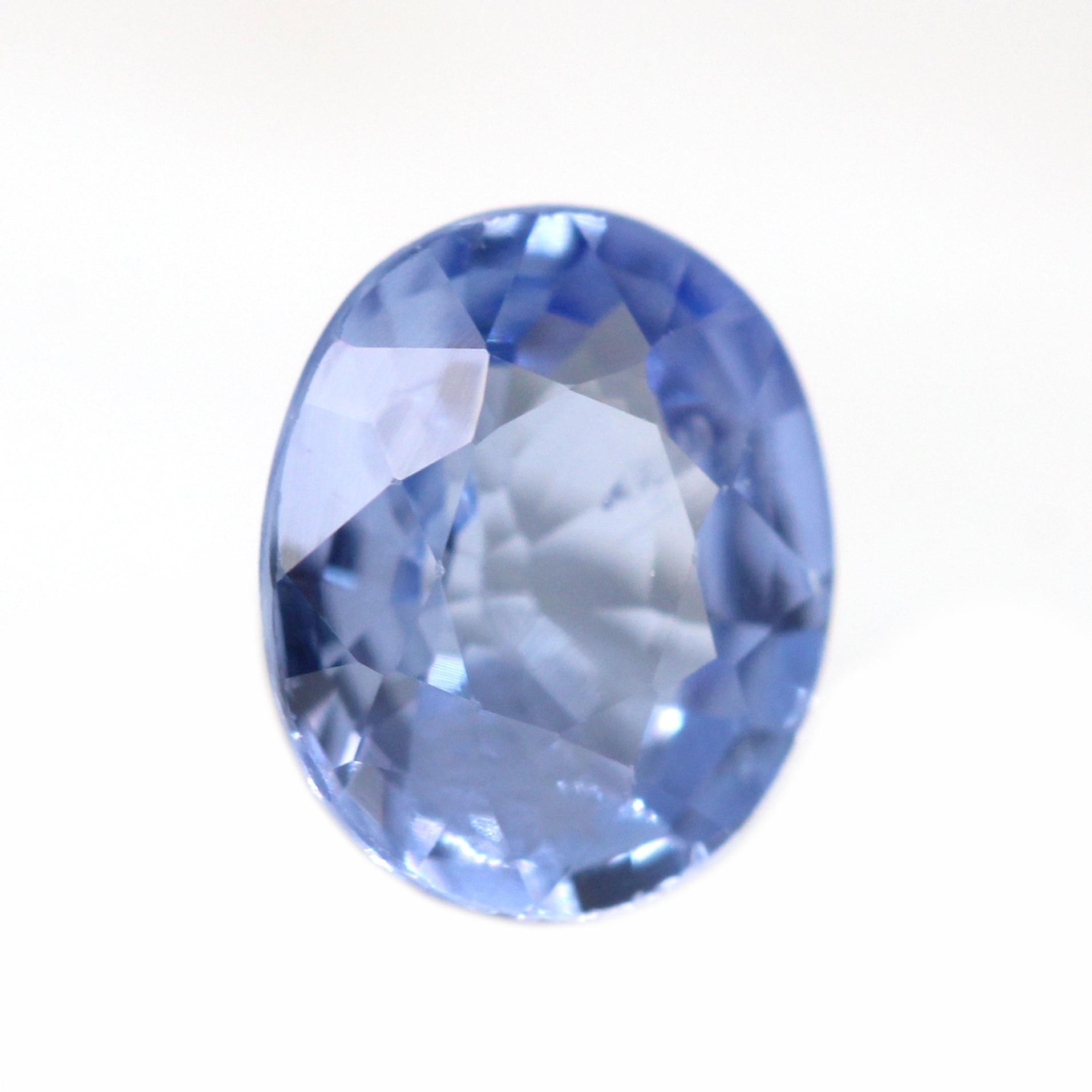 0.67 Carat Light Blue Oval Montana Sapphire for Custom Work - Inventory Code LBOS067 - Midwinter Co. Alternative Bridal Rings and Modern Fine Jewelry