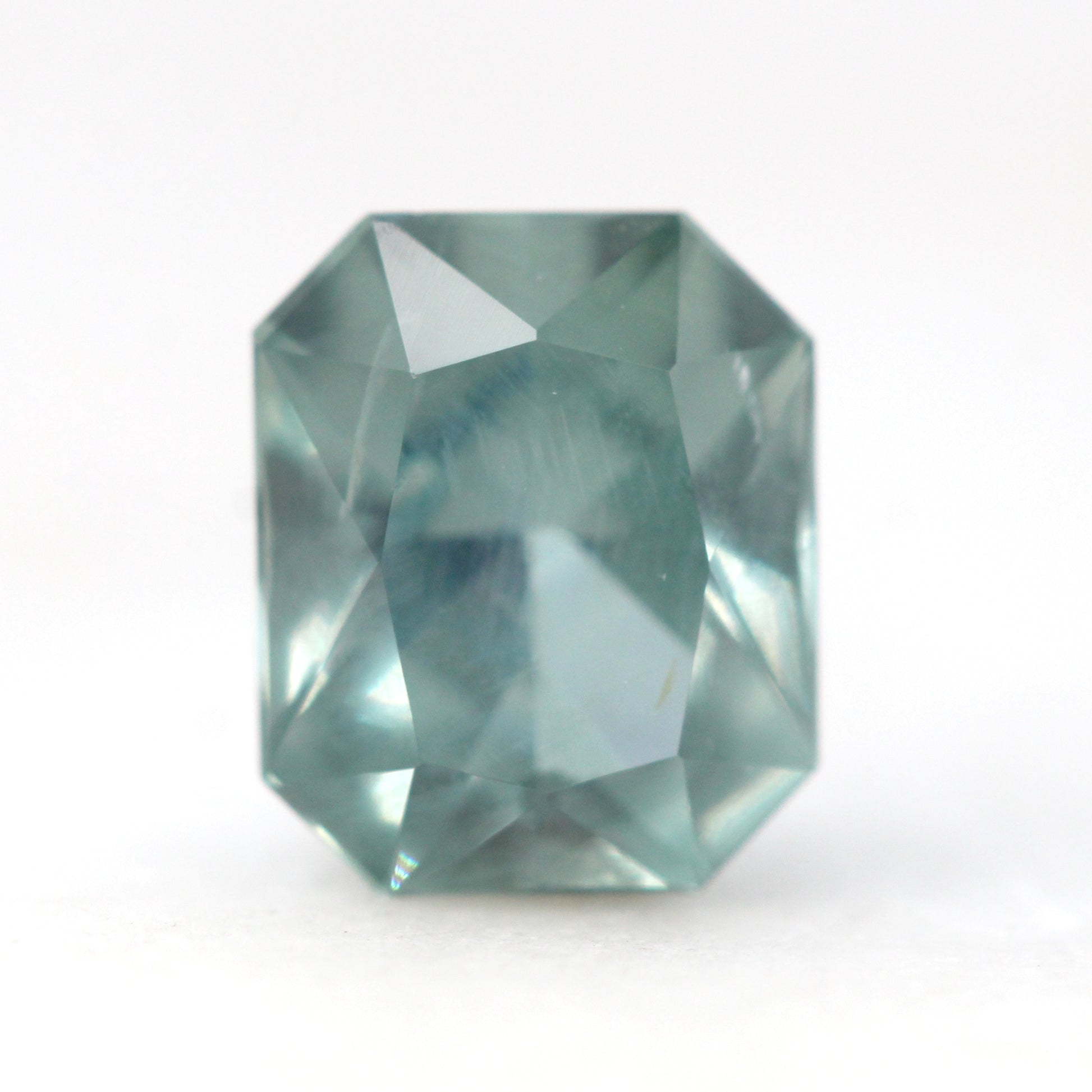 1.55 Carat Light Teal Radiant Cut Montana Sapphire for Custom Work - Inventory Code LTMS155 - Midwinter Co. Alternative Bridal Rings and Modern Fine Jewelry