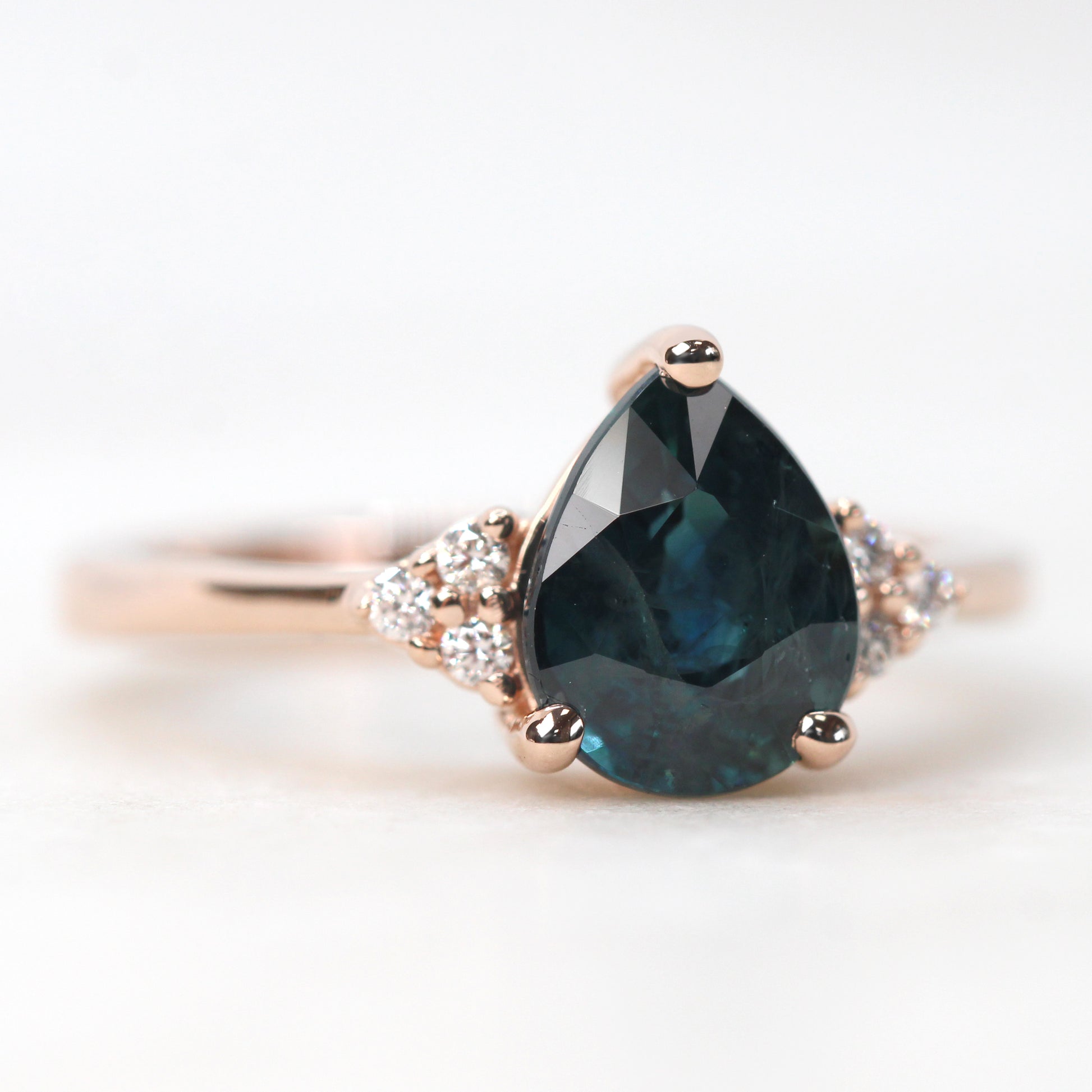 Imogene Ring with a 2.31 Carat Pear Teal Blue Sapphire and White Accent Diamonds in 14k Rose Gold - Ready to Size and Ship - Midwinter Co. Alternative Bridal Rings and Modern Fine Jewelry