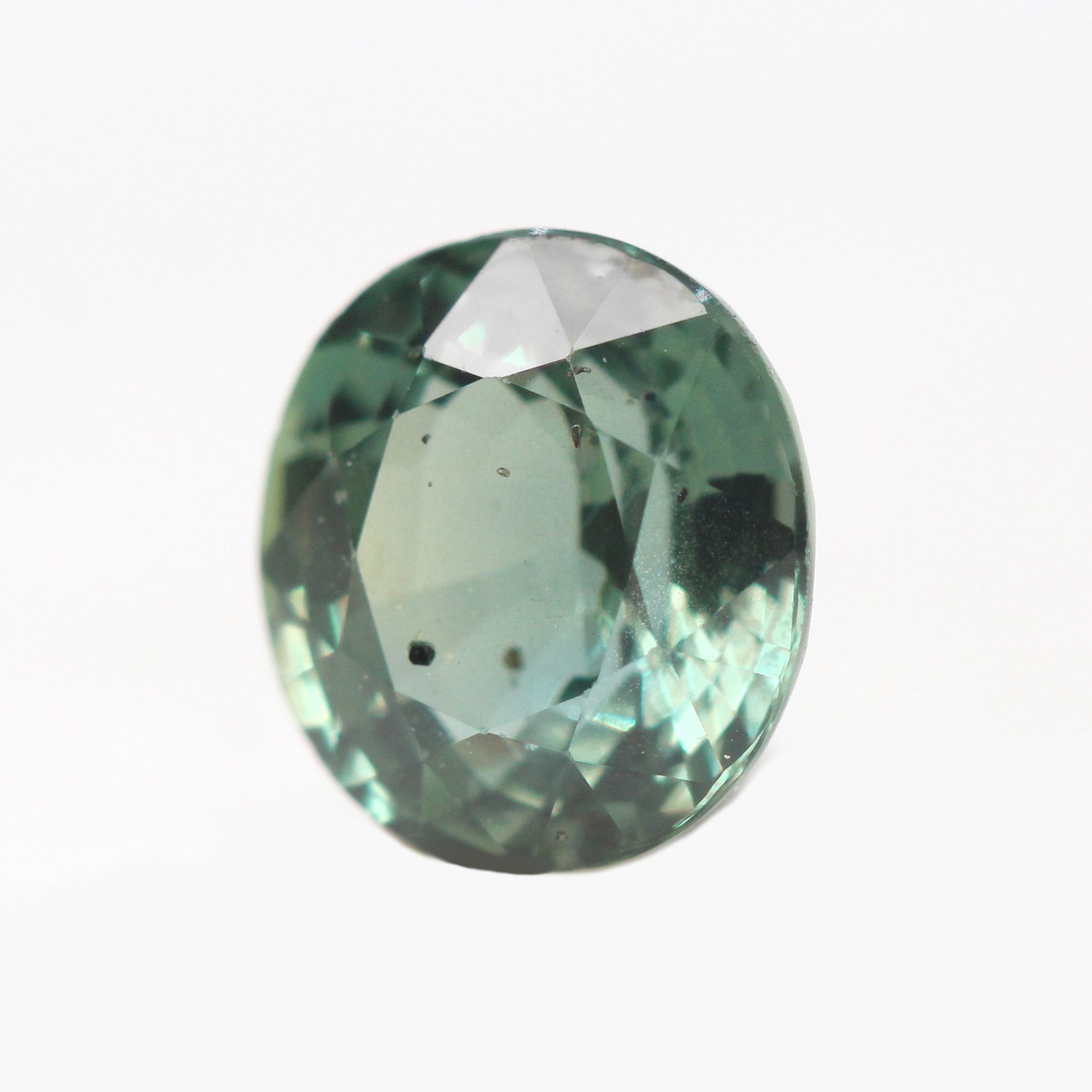 1.49 Carat Light Green Teal Sapphire for Custom Work - Inventory Code GTOS149 - Midwinter Co. Alternative Bridal Rings and Modern Fine Jewelry