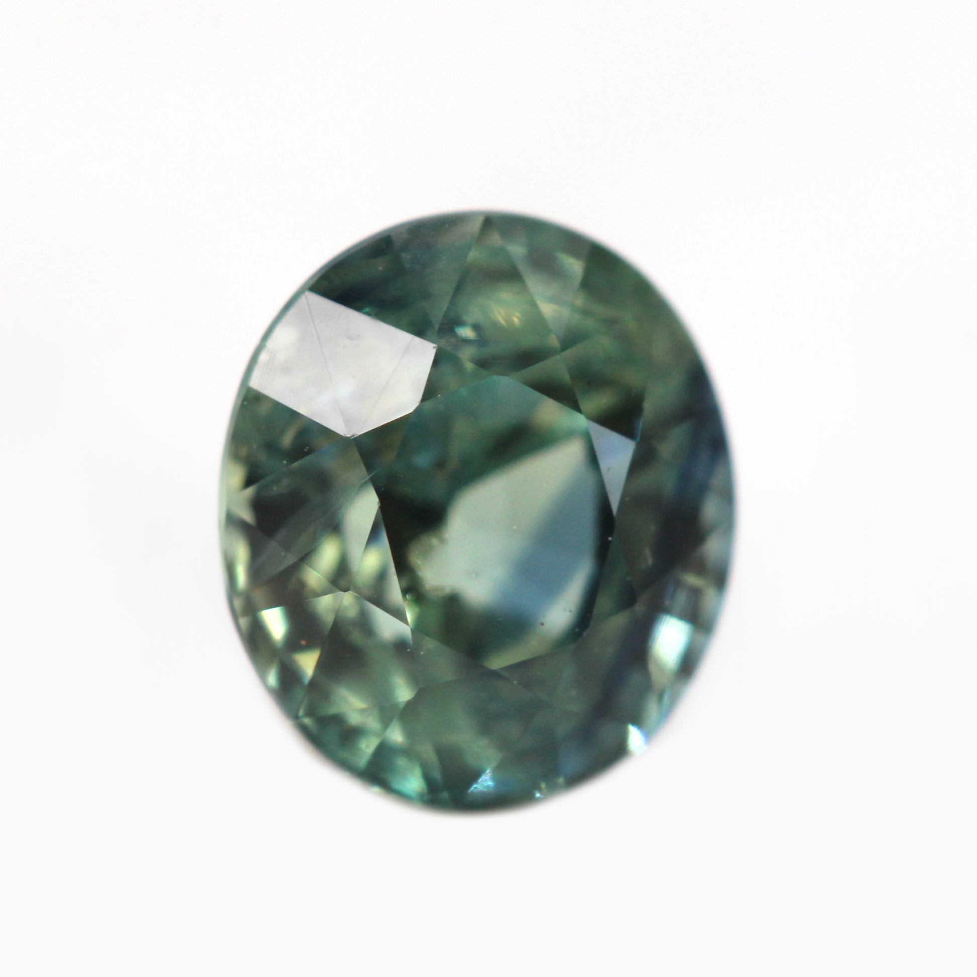 1.05 Carat Light Teal Oval Australian Sapphire for Custom Work - Inventory Code TOS105 - Midwinter Co. Alternative Bridal Rings and Modern Fine Jewelry