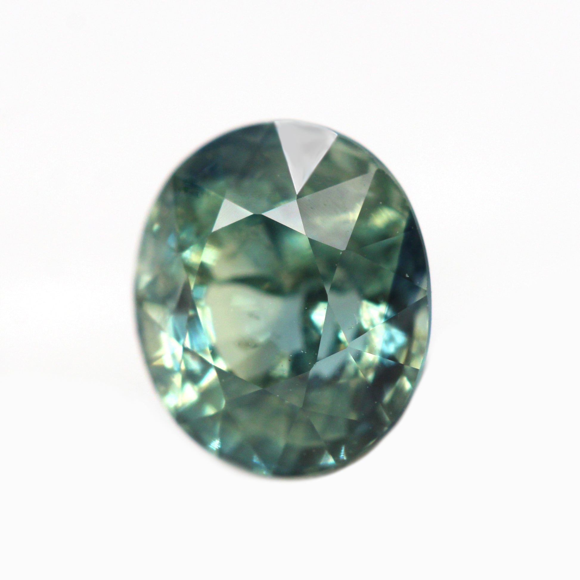 1.05 Carat Light Teal Oval Australian Sapphire for Custom Work - Inventory Code TOS105 - Midwinter Co. Alternative Bridal Rings and Modern Fine Jewelry