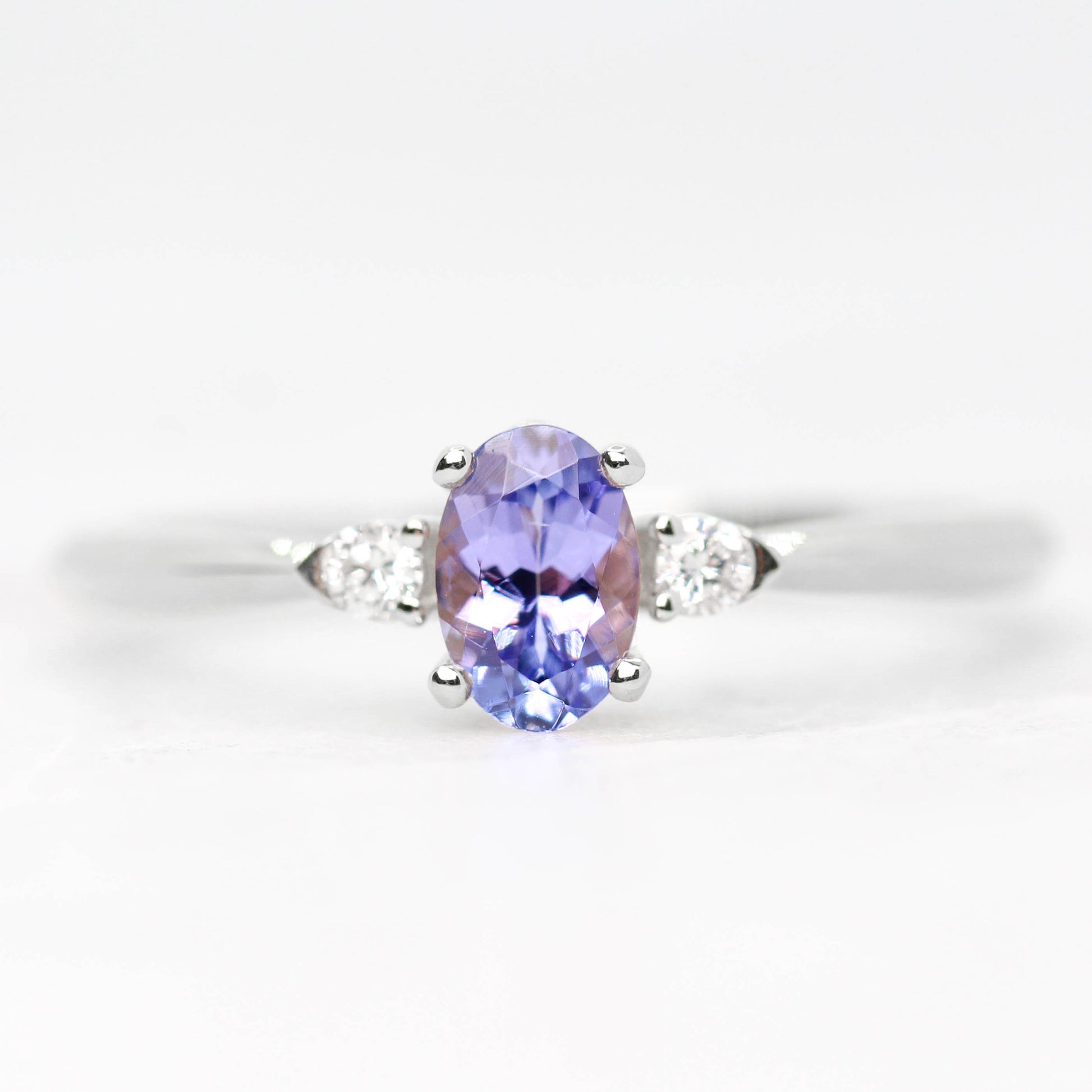 Chelsea Ring with an Oval Tanzanite and White Accent Diamonds in 14k Yellow Gold - Made to Order, Choose Your Gold Tone - Midwinter Co. Alternative Bridal Rings and Modern Fine Jewelry