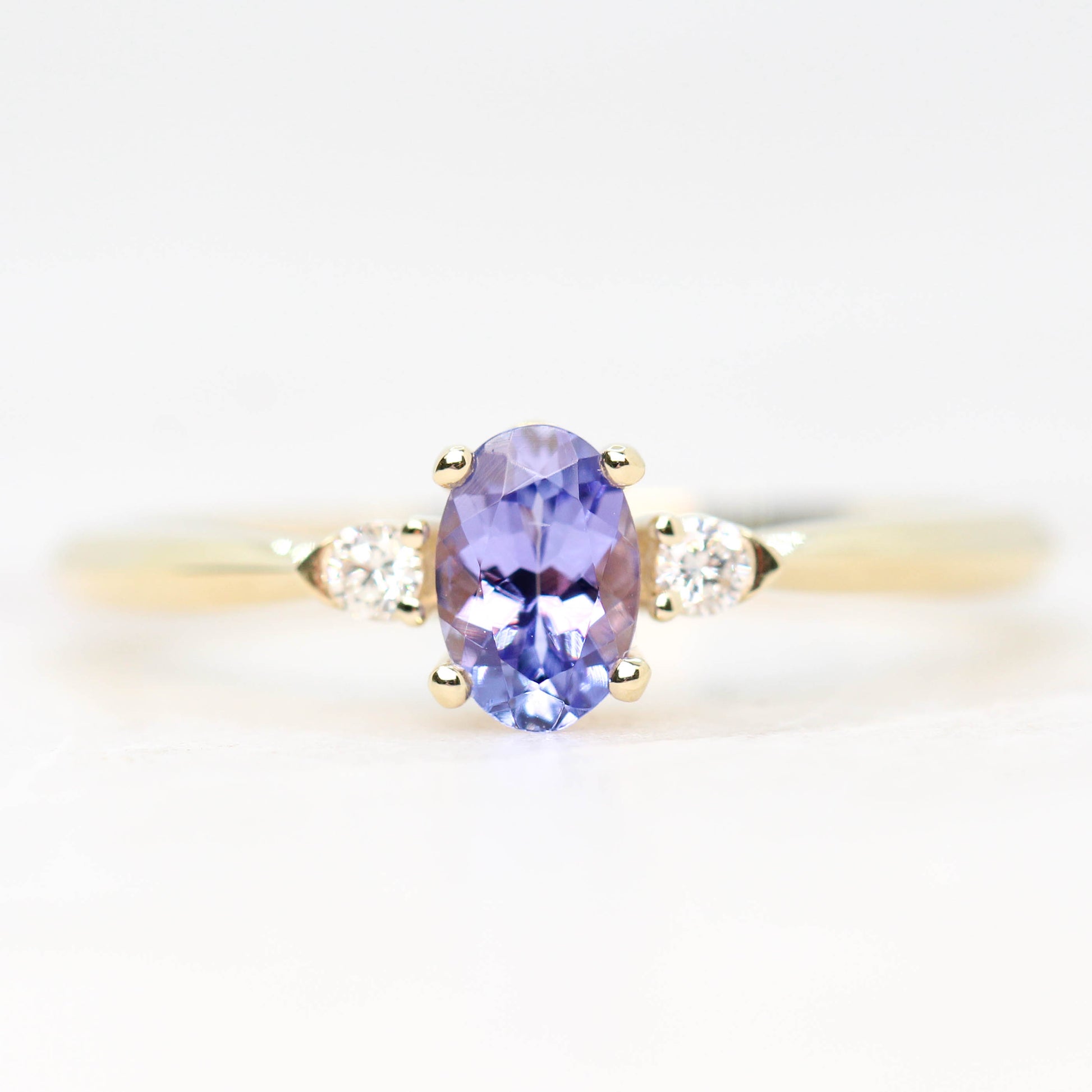 (SB ) Chelsea Ring with an Oval Tanzanite and White Accent Diamonds in 14k Yellow Gold - Made to Order, Choose Your Gold Tone - Midwinter Co. Alternative Bridal Rings and Modern Fine Jewelry