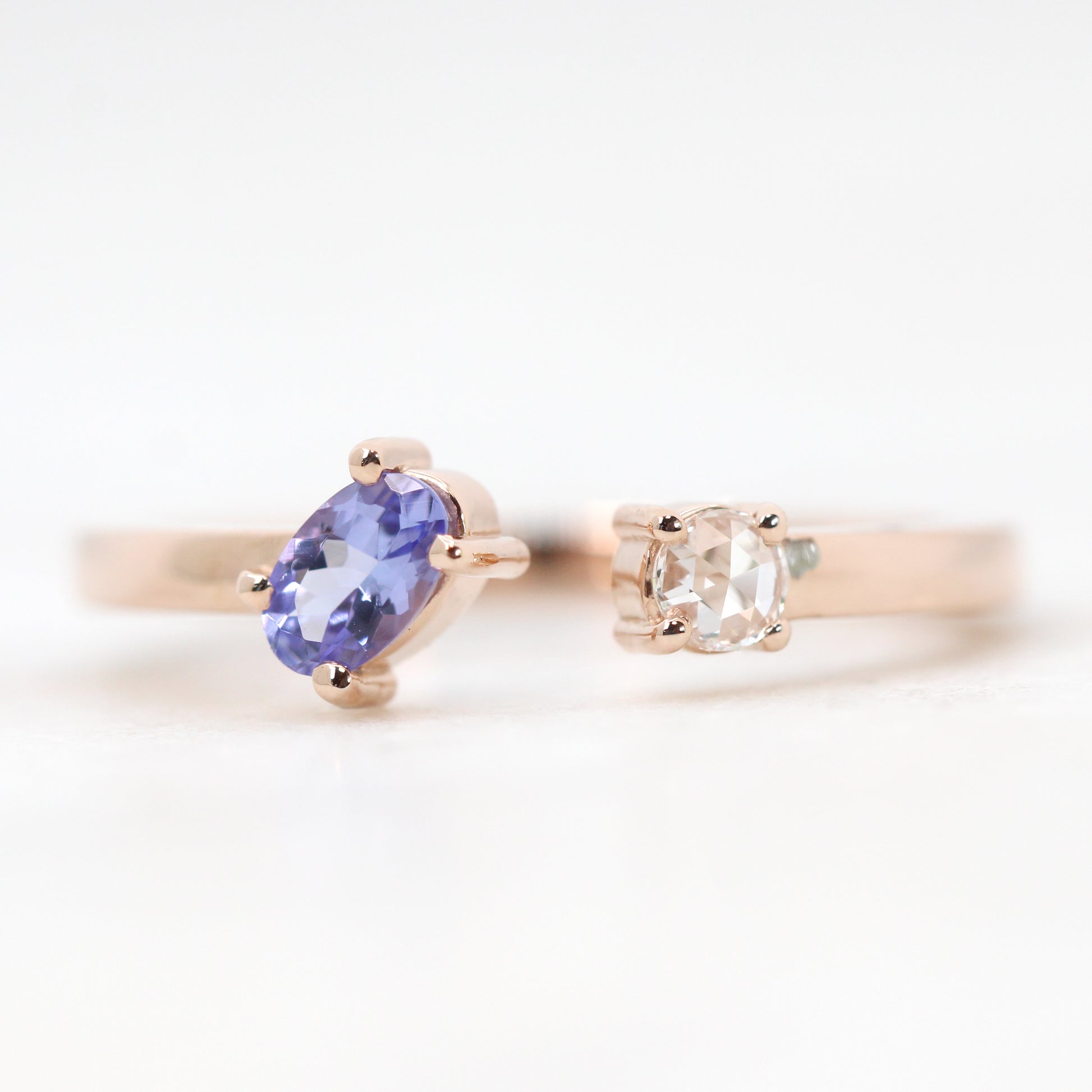 Karl Ring with an Oval Tanzanite Clear Round Diamond Made to