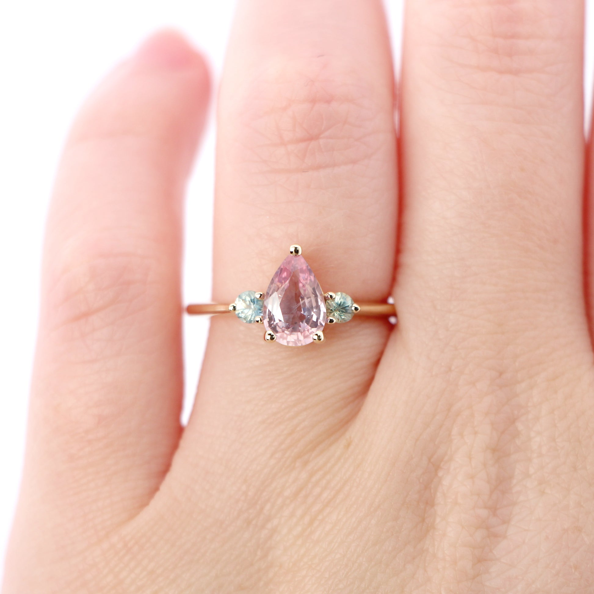 Drea Ring with a 1.40 Carat Clear Pink Pear Sapphire and Sapphire Accents in 14k Yellow Gold - Ready to Size and Ship - Midwinter Co. Alternative Bridal Rings and Modern Fine Jewelry