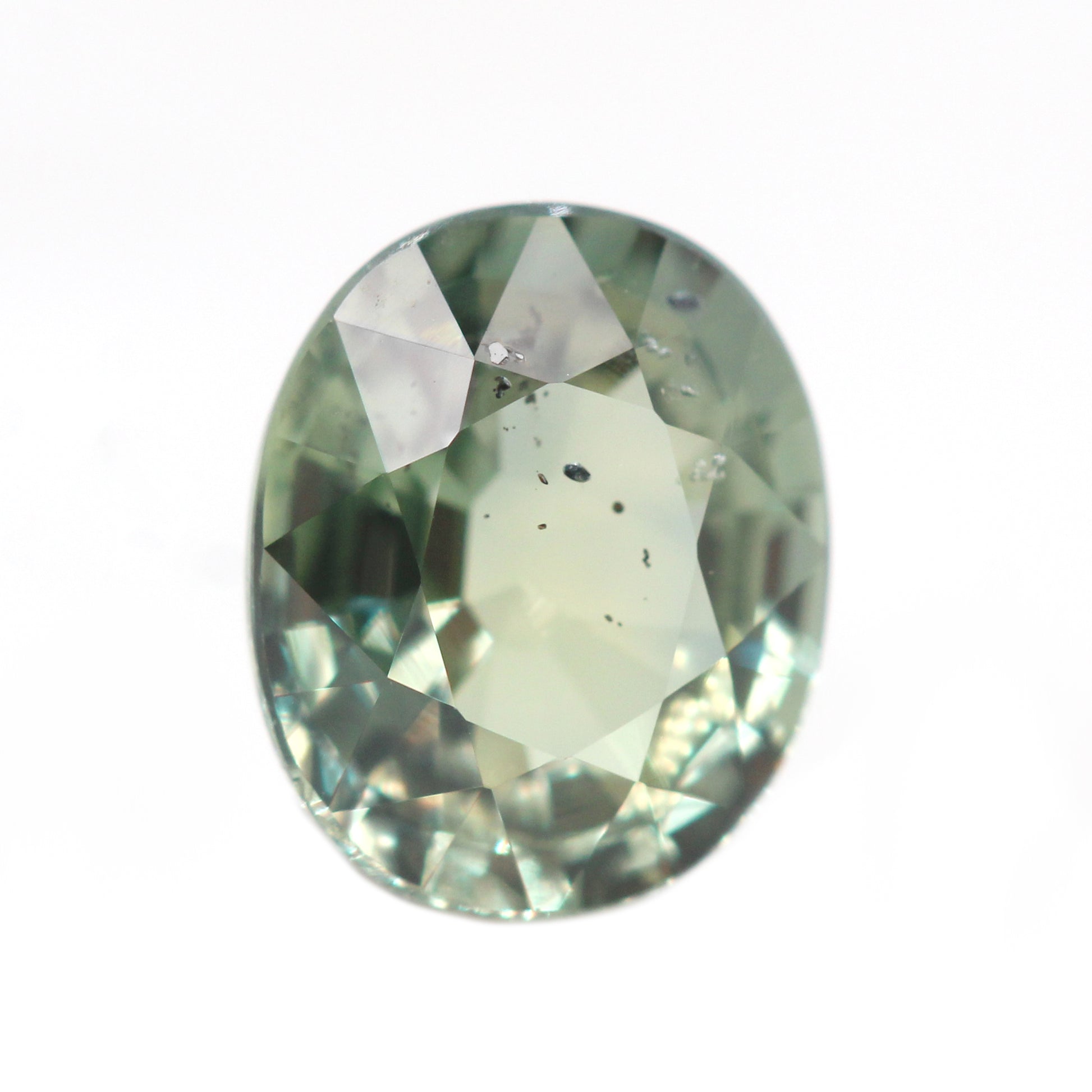 1.44 Carat Light Earthy Green Oval Sapphire for Custom Work - Inventory Code GOS144 - Midwinter Co. Alternative Bridal Rings and Modern Fine Jewelry