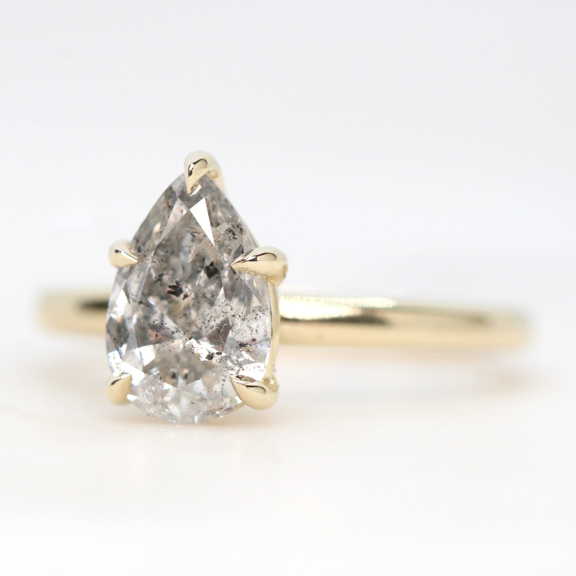 Charlotte Ring with a 1.65 Carat Pear Bright Gray Salt and Pepper Diamond in 14k Yellow Gold - Ready to Size and Ship - Midwinter Co. Alternative Bridal Rings and Modern Fine Jewelry