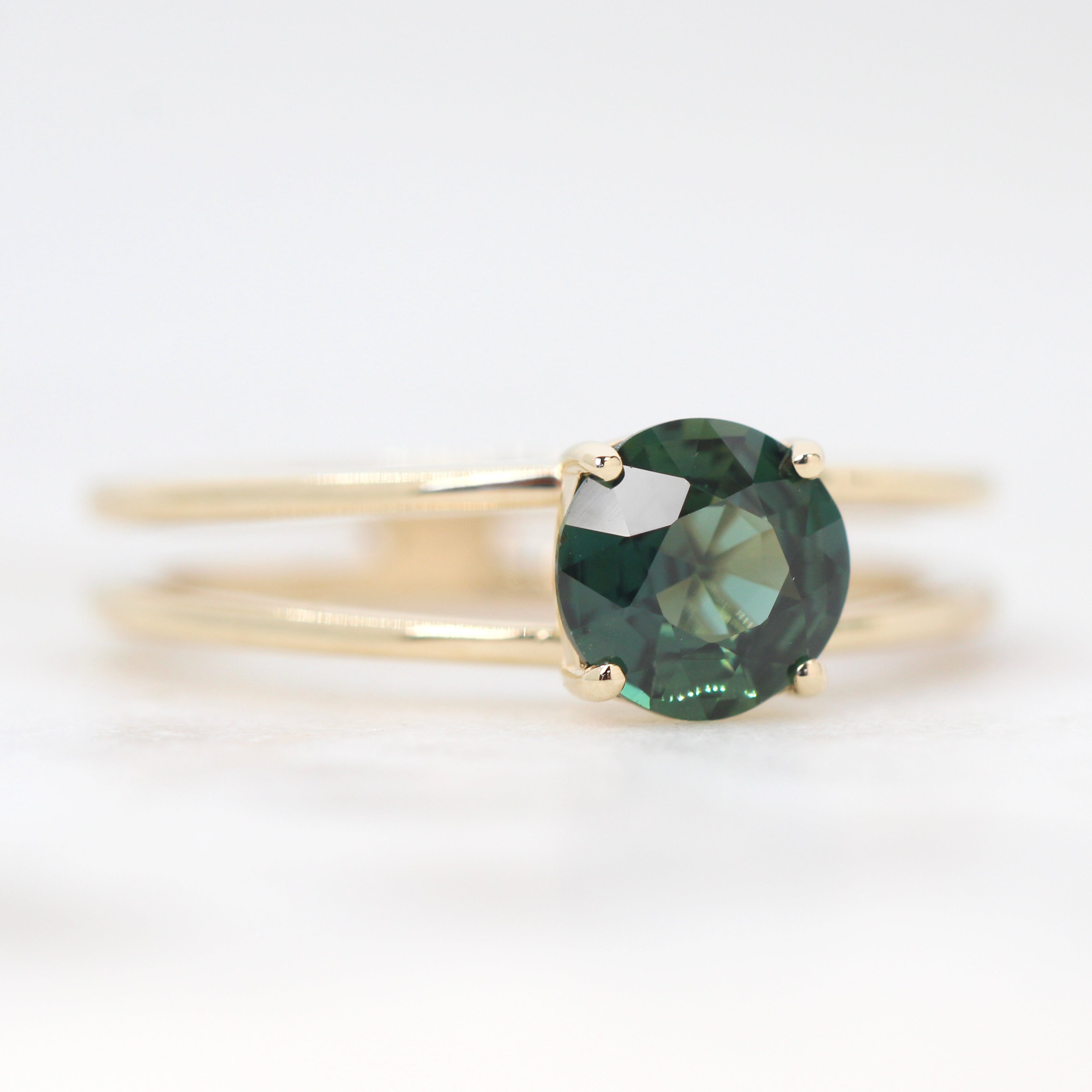 Apryl Ring with a 1.15 Carat Round Dark Teal Sapphire in 14k Yellow Gold - Ready to Size and Ship - Midwinter Co. Alternative Bridal Rings and Modern Fine Jewelry