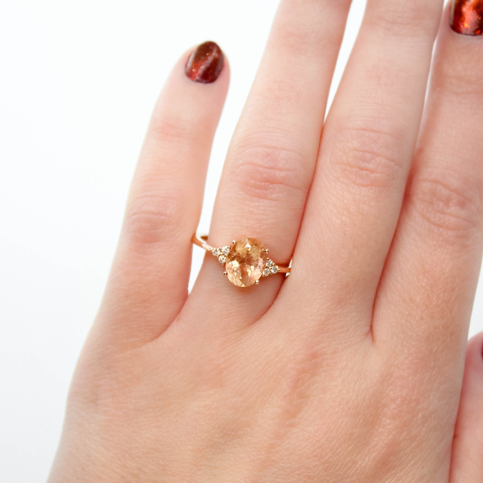Imogene Ring with a 1.99 Carat Oval Sunstone and White Accent Diamonds in 14k Rose Gold - Ready to Size and Ship - Midwinter Co. Alternative Bridal Rings and Modern Fine Jewelry