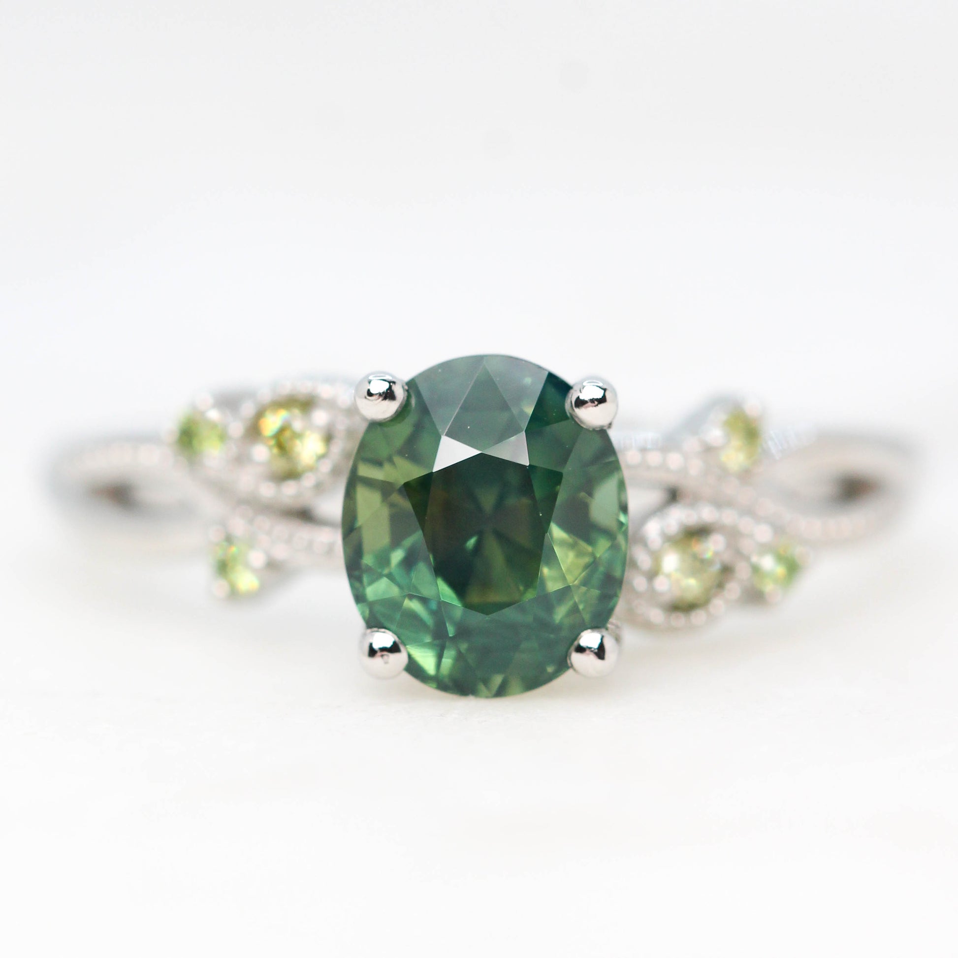 Jasmine Ring with a 2.18 Carat Oval Green Sapphire and Light Green