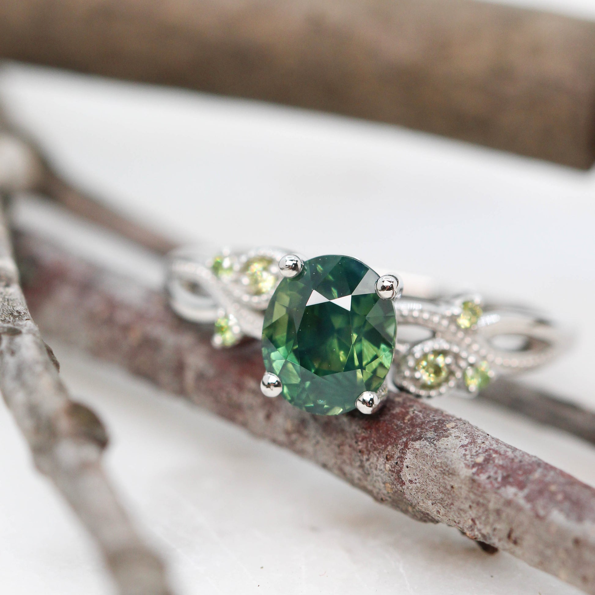 Jasmine Ring with a 2.18 Carat Oval Green Sapphire and Light Green