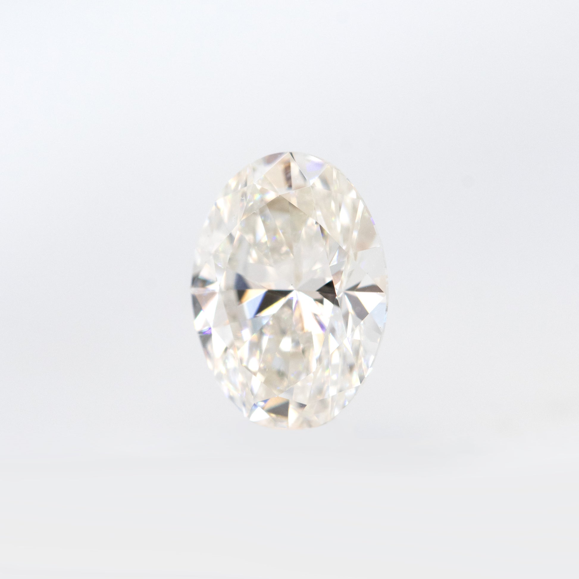 CAELEN (J) 1.00 Carat IGI Certified Lab Grown Oval Diamond for Custom Work - Inventory Code LGO100 - Midwinter Co. Alternative Bridal Rings and Modern Fine Jewelry