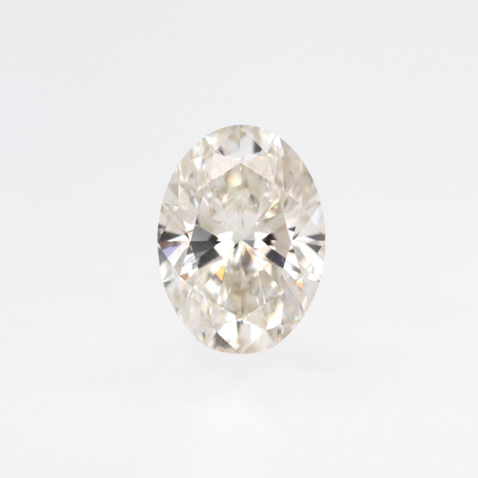 CAELEN (J) 1.01 Carat Certified Lab Grown Oval Diamond for Custom Work - Inventory Code LGO101 - Midwinter Co. Alternative Bridal Rings and Modern Fine Jewelry