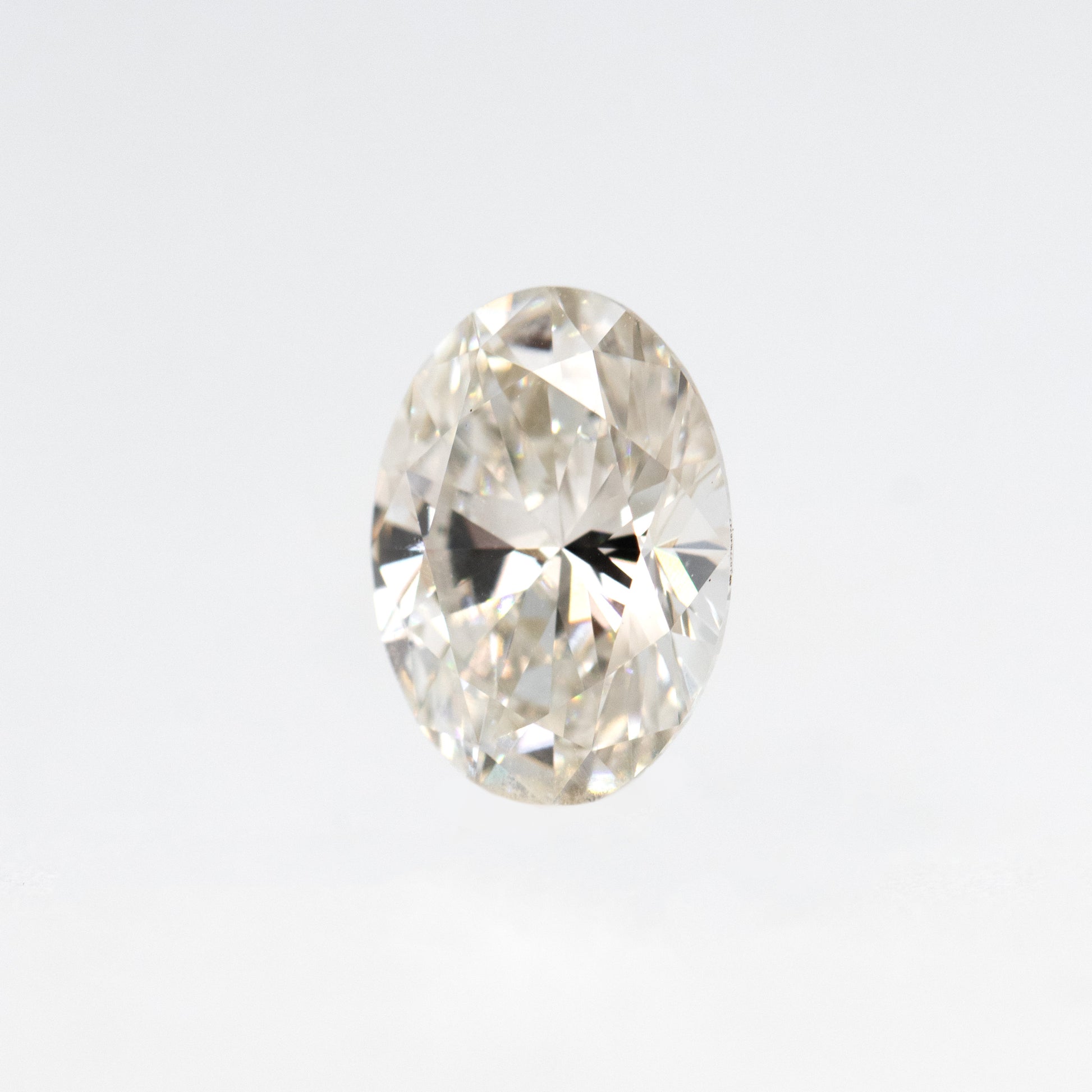 CAELEN (J) 1.01 Carat Certified Lab Grown Oval Diamond for Custom Work - Inventory Code LGO101 - Midwinter Co. Alternative Bridal Rings and Modern Fine Jewelry