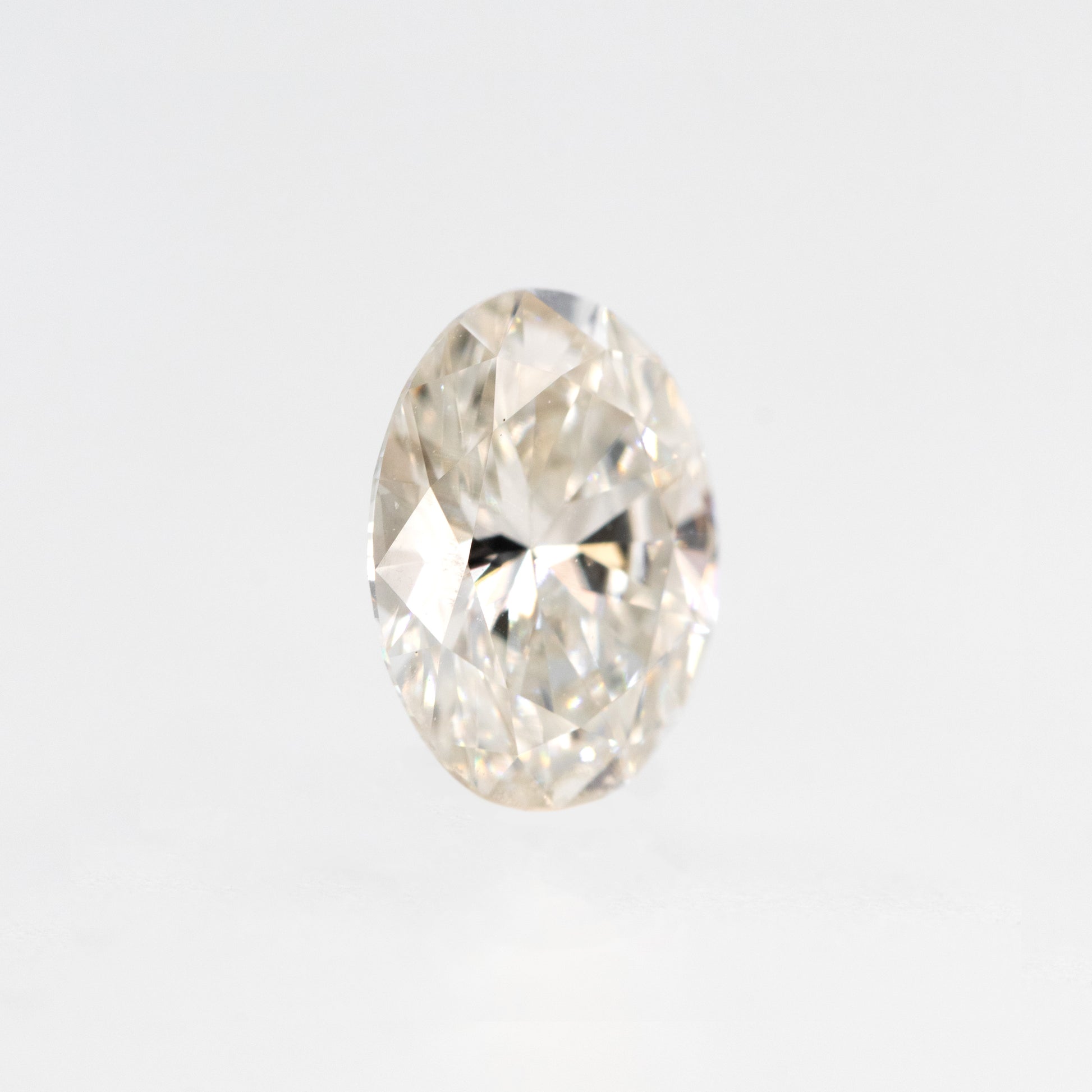 CAELEN (J) 1.01 Carat Certified Lab Grown Oval Diamond for Custom Work - Inventory Code LGO101 - Midwinter Co. Alternative Bridal Rings and Modern Fine Jewelry