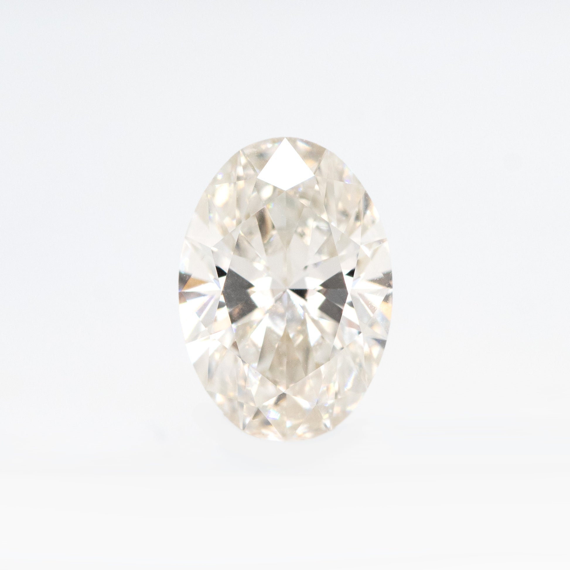 CAELEN (J) 1.08 Carat Certified Lab Grown Oval Diamond for Custom Work - Inventory Code LGO108 - Midwinter Co. Alternative Bridal Rings and Modern Fine Jewelry