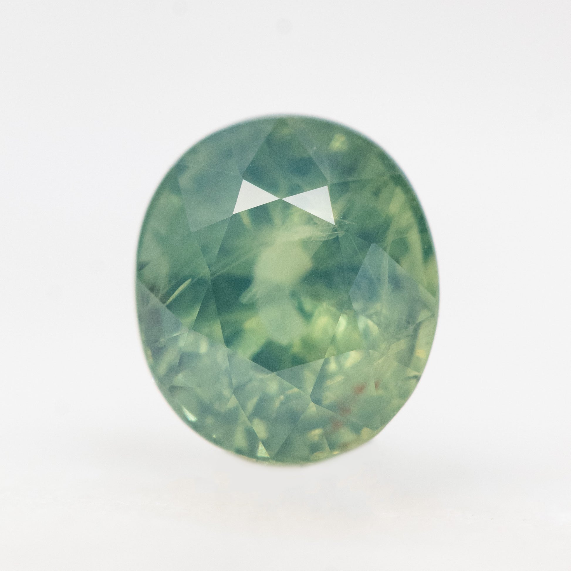 2.13 Carat Light Teal Oval Sapphire for Custom Work - Inventory Code LGOS213 - Midwinter Co. Alternative Bridal Rings and Modern Fine Jewelry