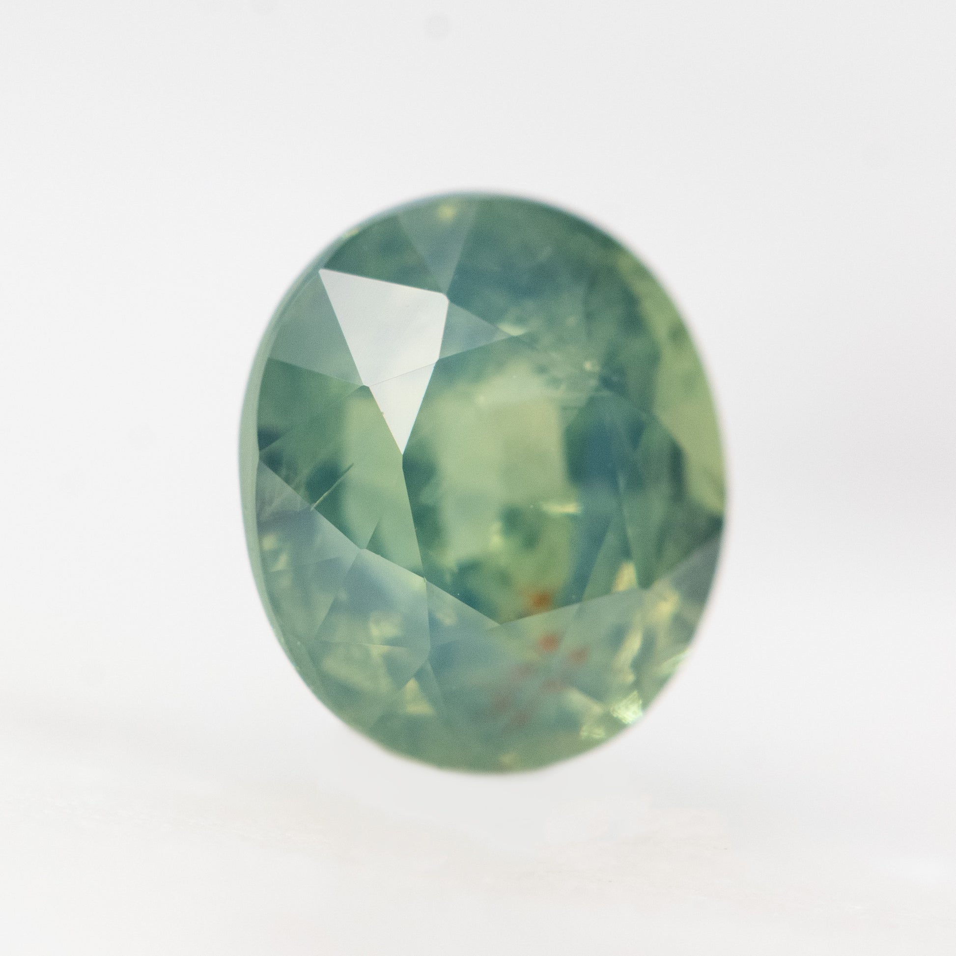 2.13 Carat Light Teal Oval Sapphire for Custom Work - Inventory Code LGOS213 - Midwinter Co. Alternative Bridal Rings and Modern Fine Jewelry