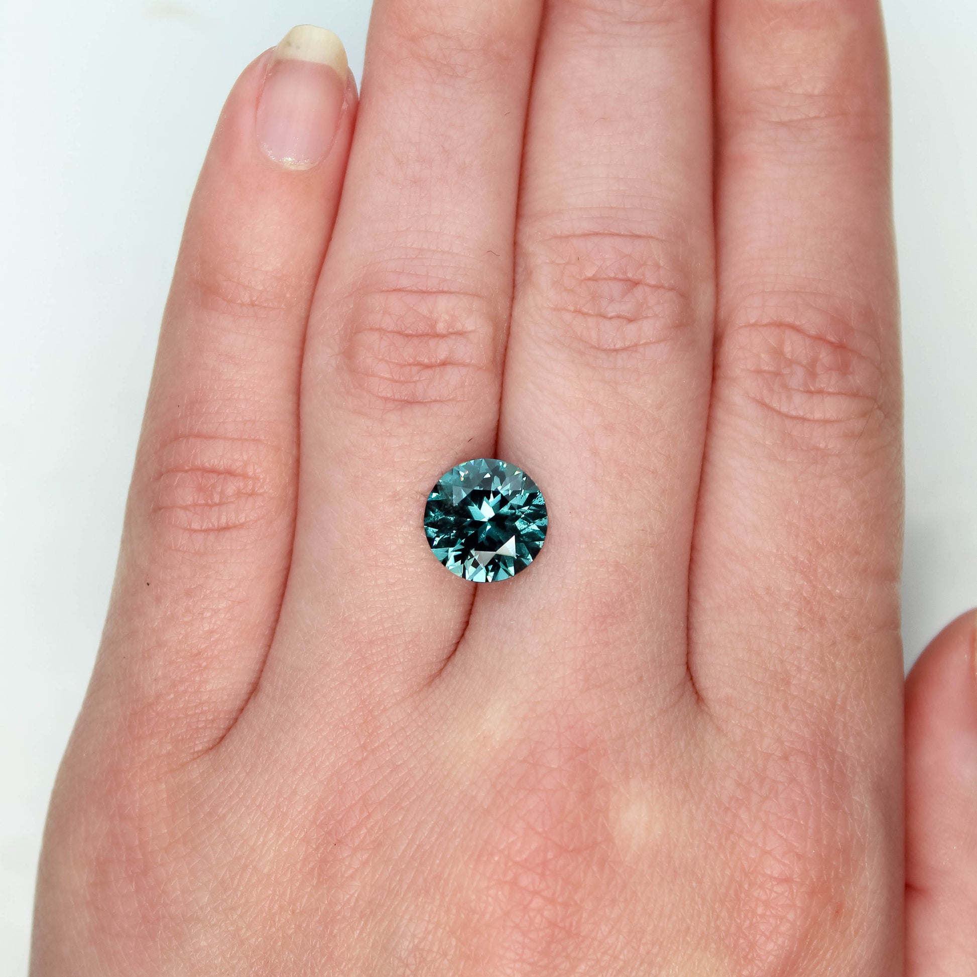 CAELEN (J) 3.98 Carat Round Teal Lab Grown Sapphire for Custom Work - Inventory Code LGRS398 - Midwinter Co. Alternative Bridal Rings and Modern Fine Jewelry