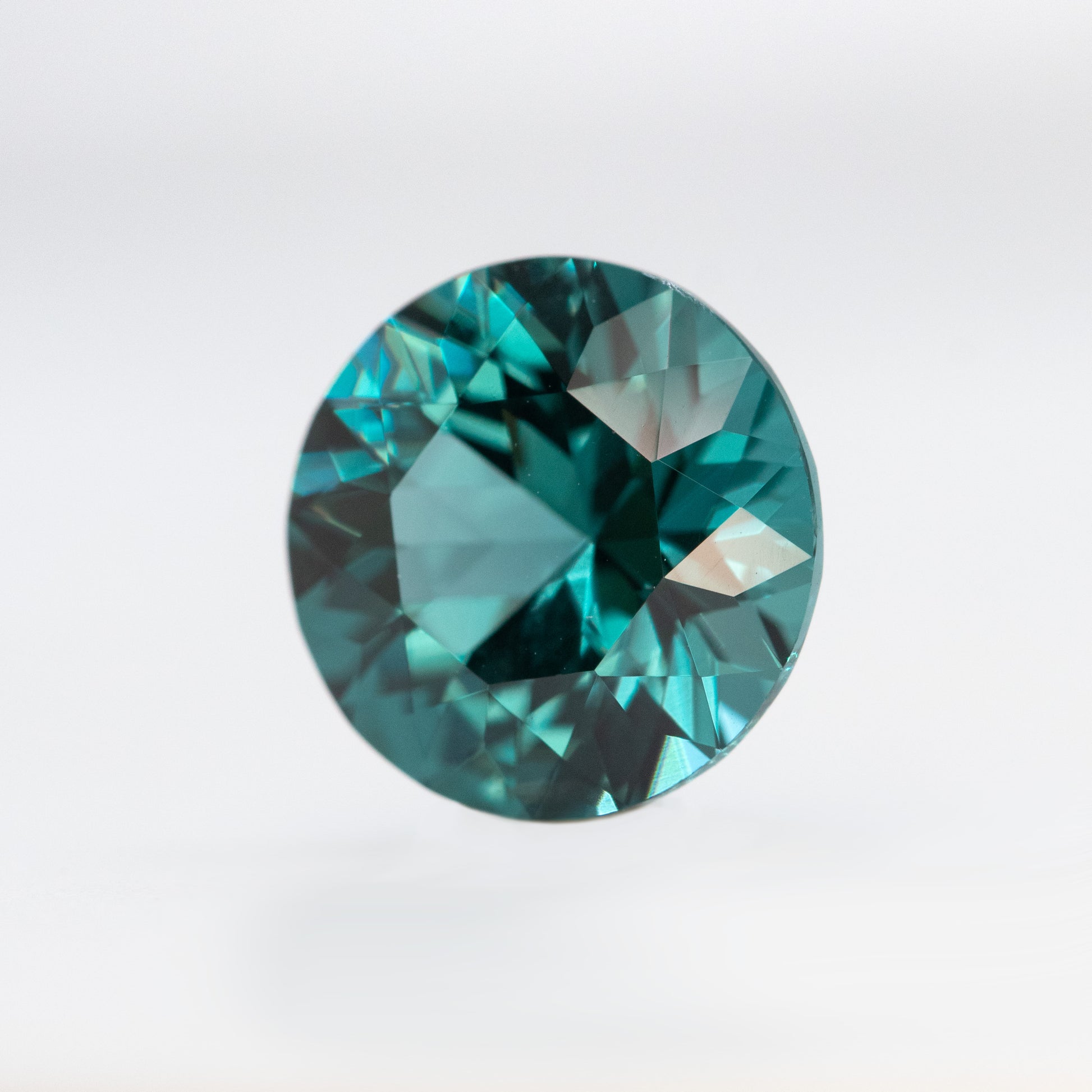 CAELEN (J) 3.98 Carat Round Teal Lab Grown Sapphire for Custom Work - Inventory Code LGRS398 - Midwinter Co. Alternative Bridal Rings and Modern Fine Jewelry