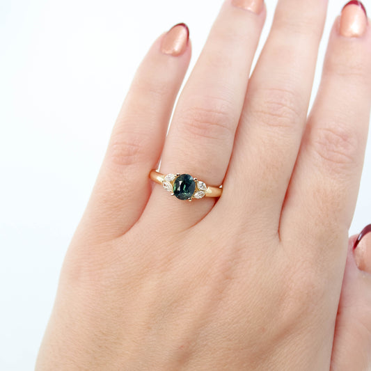 Marisol Ring with a 1.16 Carat Teal Oval Sapphire and White Accent Diamonds in 14k Yellow Gold - Ready to Size and Ship