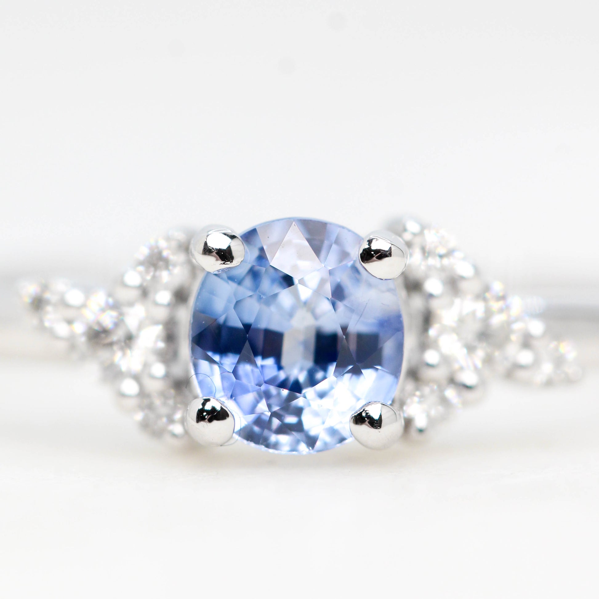 Marley Ring with a 0.60 Carat Round Blue Montana Sapphire and White Accent Diamonds in 14k White Gold - Ready to Size and Ship - Midwinter Co. Alternative Bridal Rings and Modern Fine Jewelry