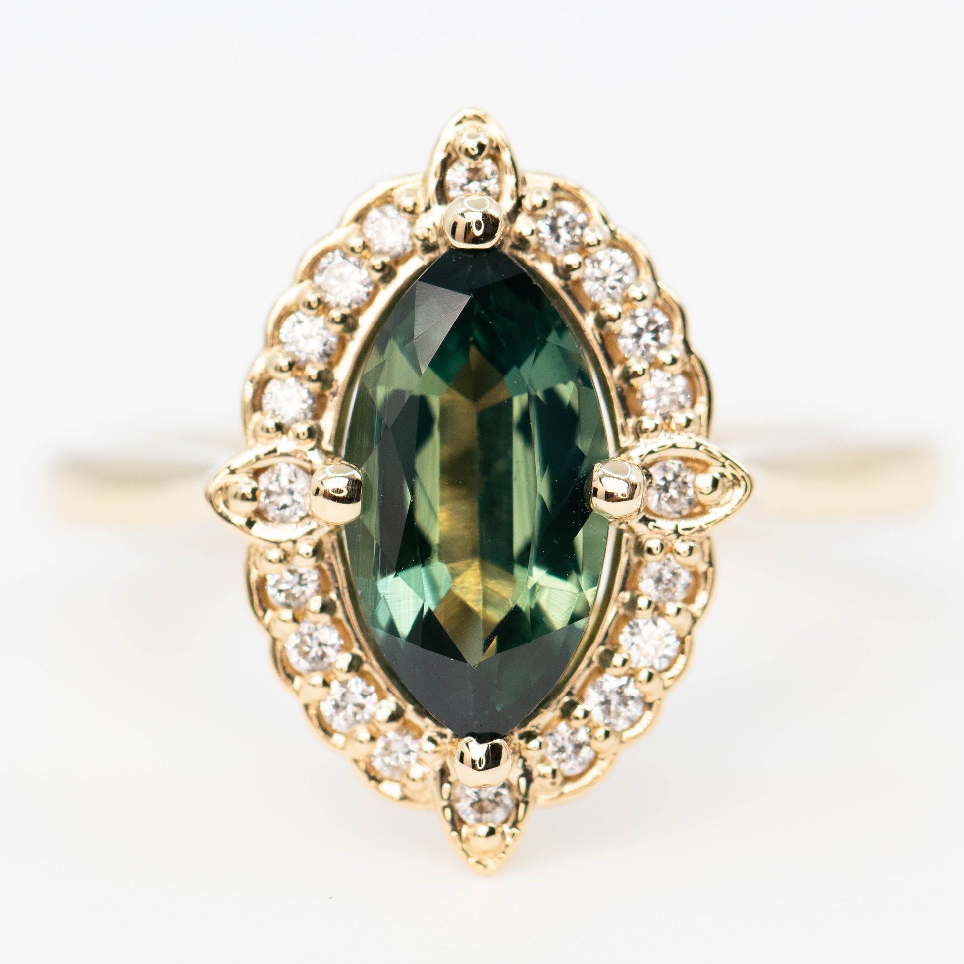 McKenzie Ring with a 1.66 Carat Teal Marquise Sapphire and White Accent Diamonds in 14k Yellow Gold - Ready to Size and Ship - Midwinter Co. Alternative Bridal Rings and Modern Fine Jewelry