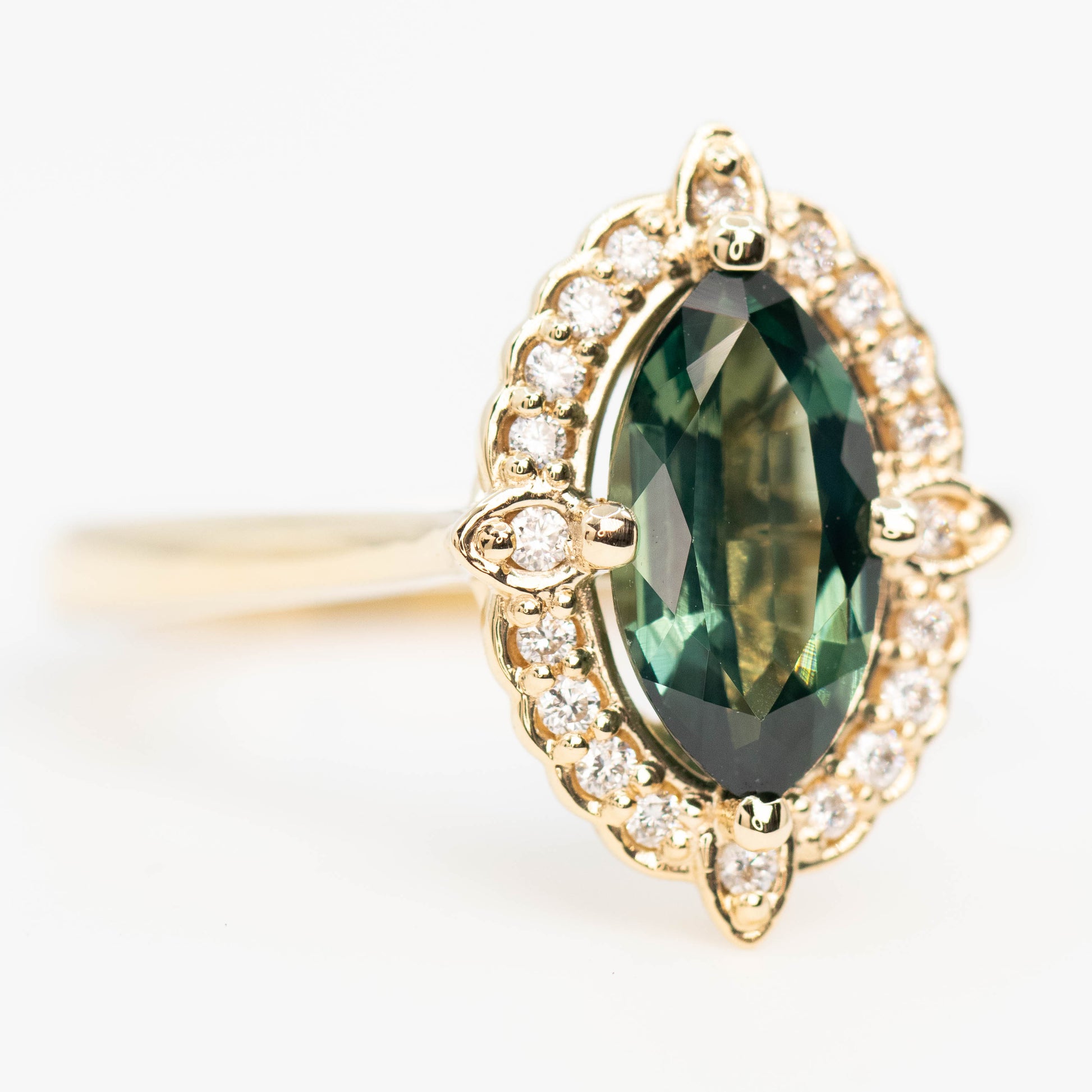 McKenzie Ring with a 1.66 Carat Teal Marquise Sapphire and White Accent Diamonds in 14k Yellow Gold - Ready to Size and Ship - Midwinter Co. Alternative Bridal Rings and Modern Fine Jewelry
