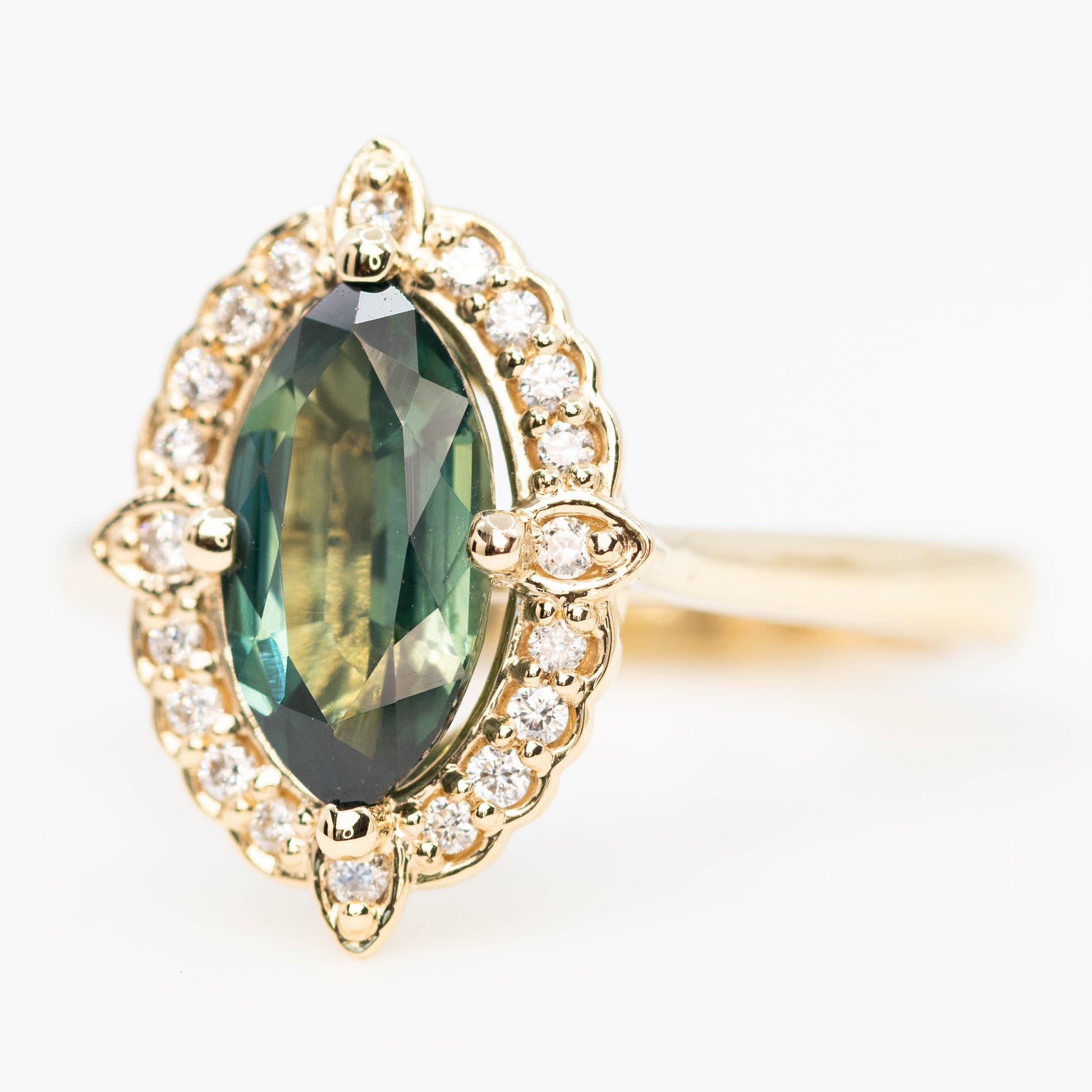 McKenzie Ring with a 1.66 Carat Teal Marquise Sapphire and White Accent Diamonds in 14k Yellow Gold - Ready to Size and Ship - Midwinter Co. Alternative Bridal Rings and Modern Fine Jewelry
