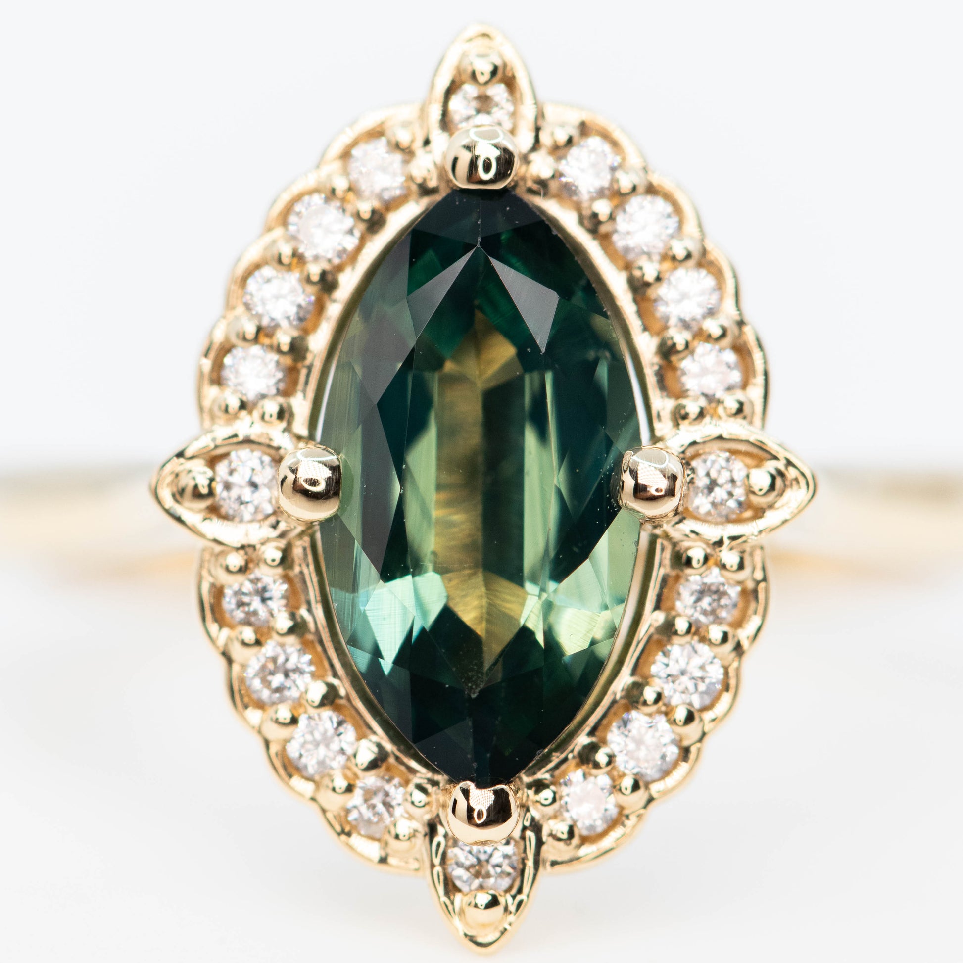 McKenzie Ring with a 1.66 Carat Teal Marquise Sapphire and White Accent Diamonds in 14k Yellow Gold - Ready to Size and Ship - Midwinter Co. Alternative Bridal Rings and Modern Fine Jewelry