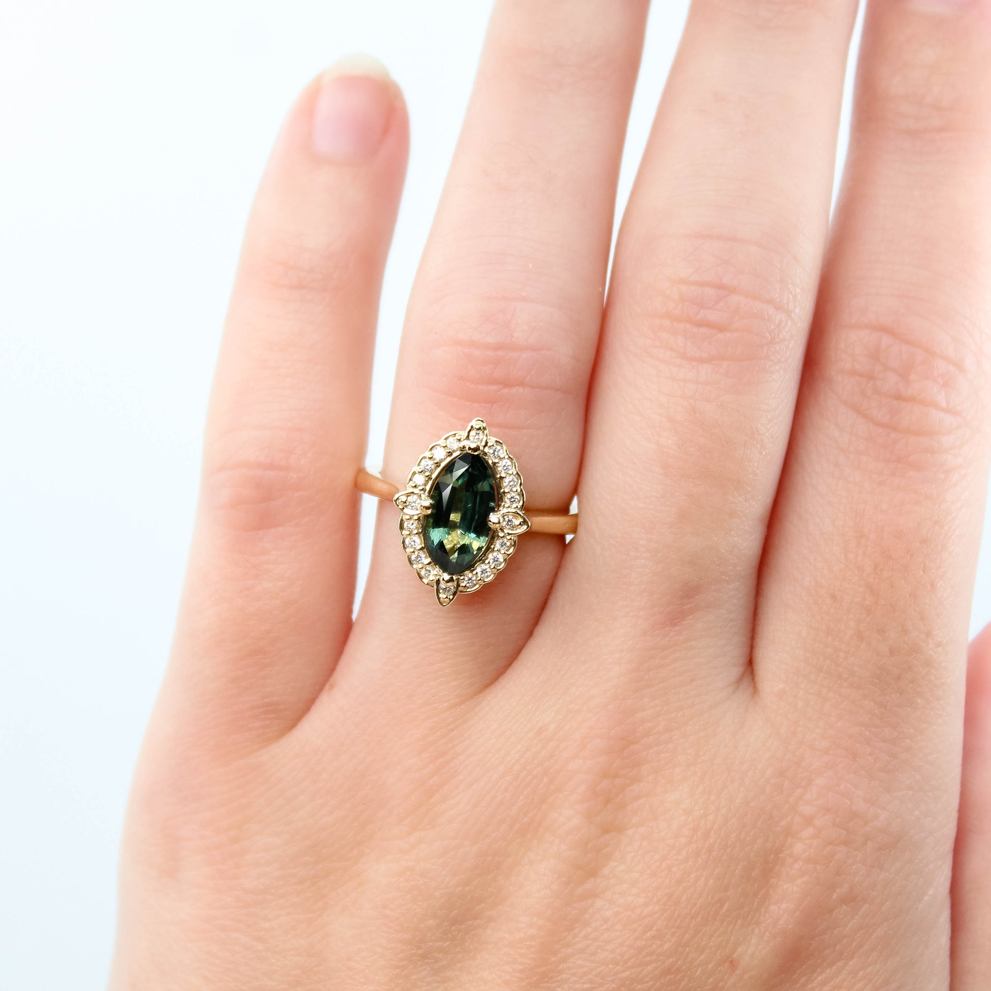 McKenzie Ring with a 1.66 Carat Teal Marquise Sapphire and White Accent Diamonds in 14k Yellow Gold - Ready to Size and Ship - Midwinter Co. Alternative Bridal Rings and Modern Fine Jewelry