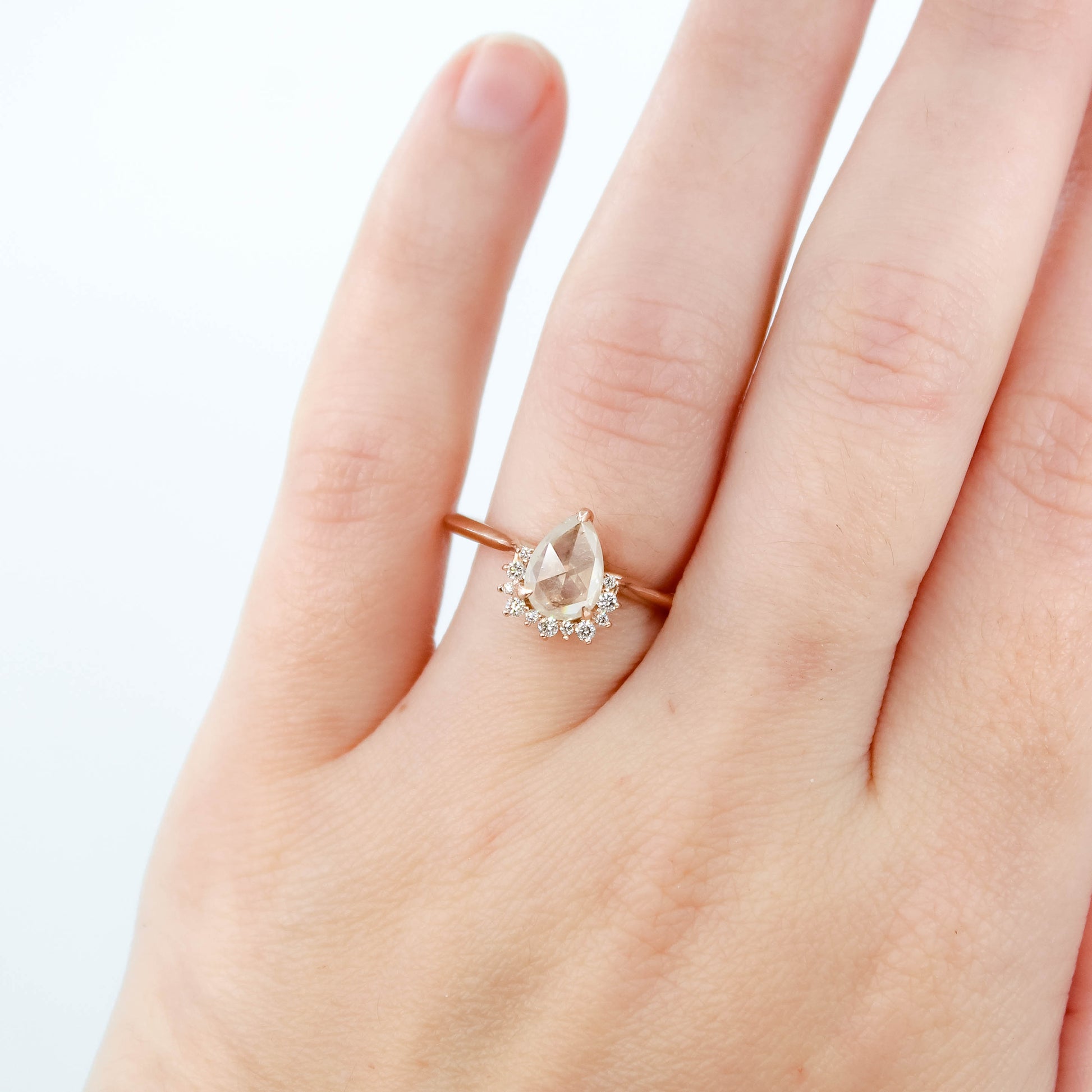 Nadine Ring with a 1.07 Carat Misty White Pear Diamond and White Accent Diamonds in 14k Rose Gold - Ready to Size and Ship - Midwinter Co. Alternative Bridal Rings and Modern Fine Jewelry