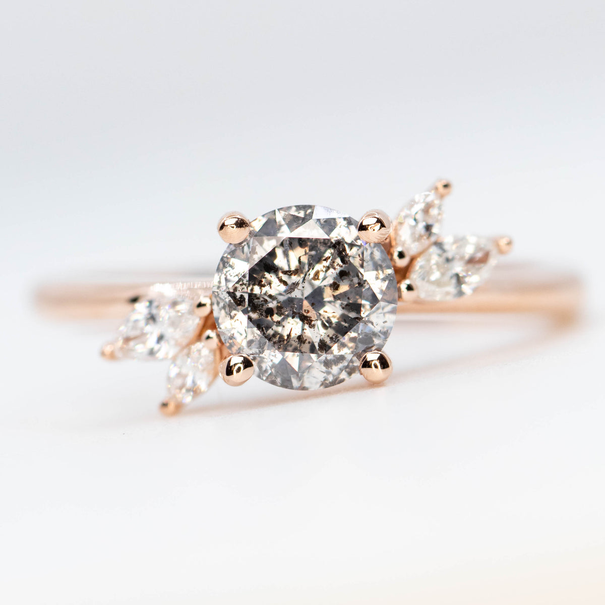 CAELEN (J) Neko Ring with a 1.06 Carat Dark Gray Round Diamond and White Accent Diamonds in 14k Rose Gold - Ready to Size and Ship - Midwinter Co. Alternative Bridal Rings and Modern Fine Jewelry