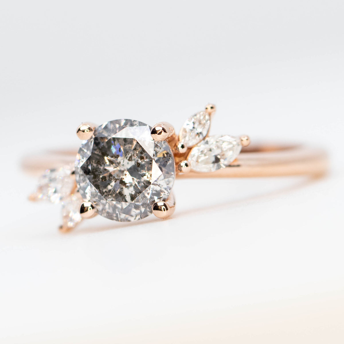 CAELEN (J) Neko Ring with a 1.06 Carat Dark Gray Round Diamond and White Accent Diamonds in 14k Rose Gold - Ready to Size and Ship - Midwinter Co. Alternative Bridal Rings and Modern Fine Jewelry