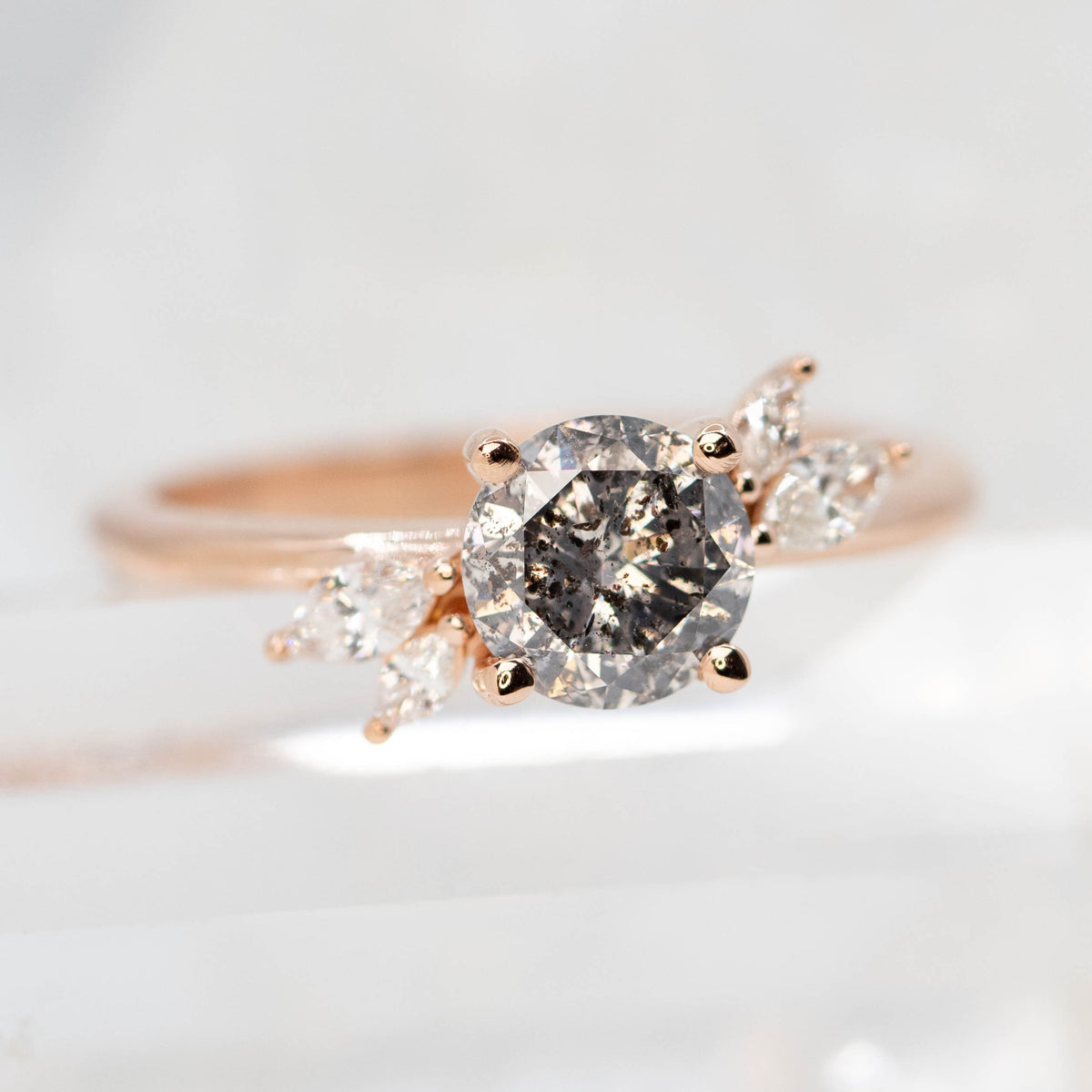 CAELEN (J) Neko Ring with a 1.06 Carat Dark Gray Round Diamond and White Accent Diamonds in 14k Rose Gold - Ready to Size and Ship - Midwinter Co. Alternative Bridal Rings and Modern Fine Jewelry