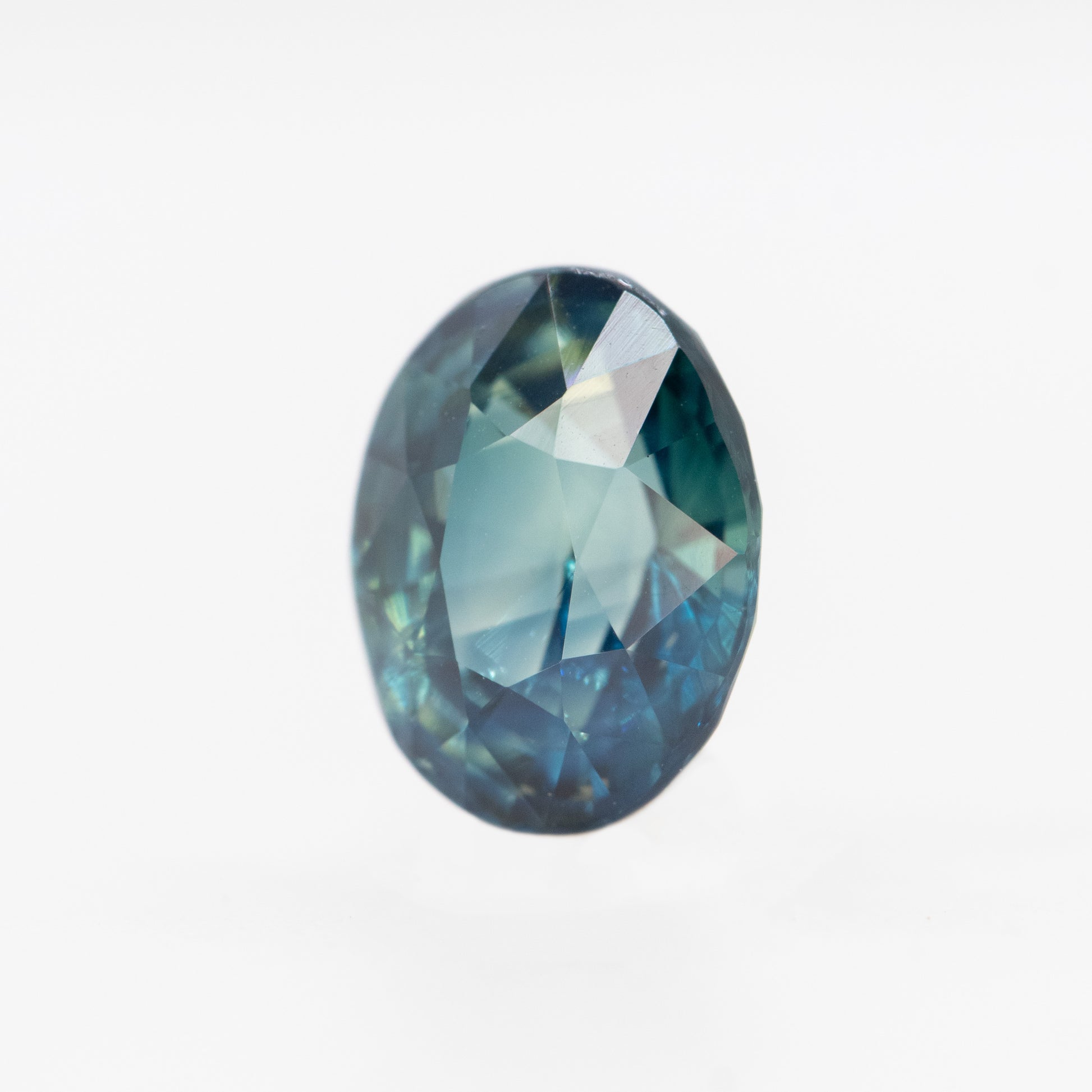 2.02 Carat Teal Blue Oval Sapphire for Custom Work - Inventory Code TBOS202 - Midwinter Co. Alternative Bridal Rings and Modern Fine Jewelry