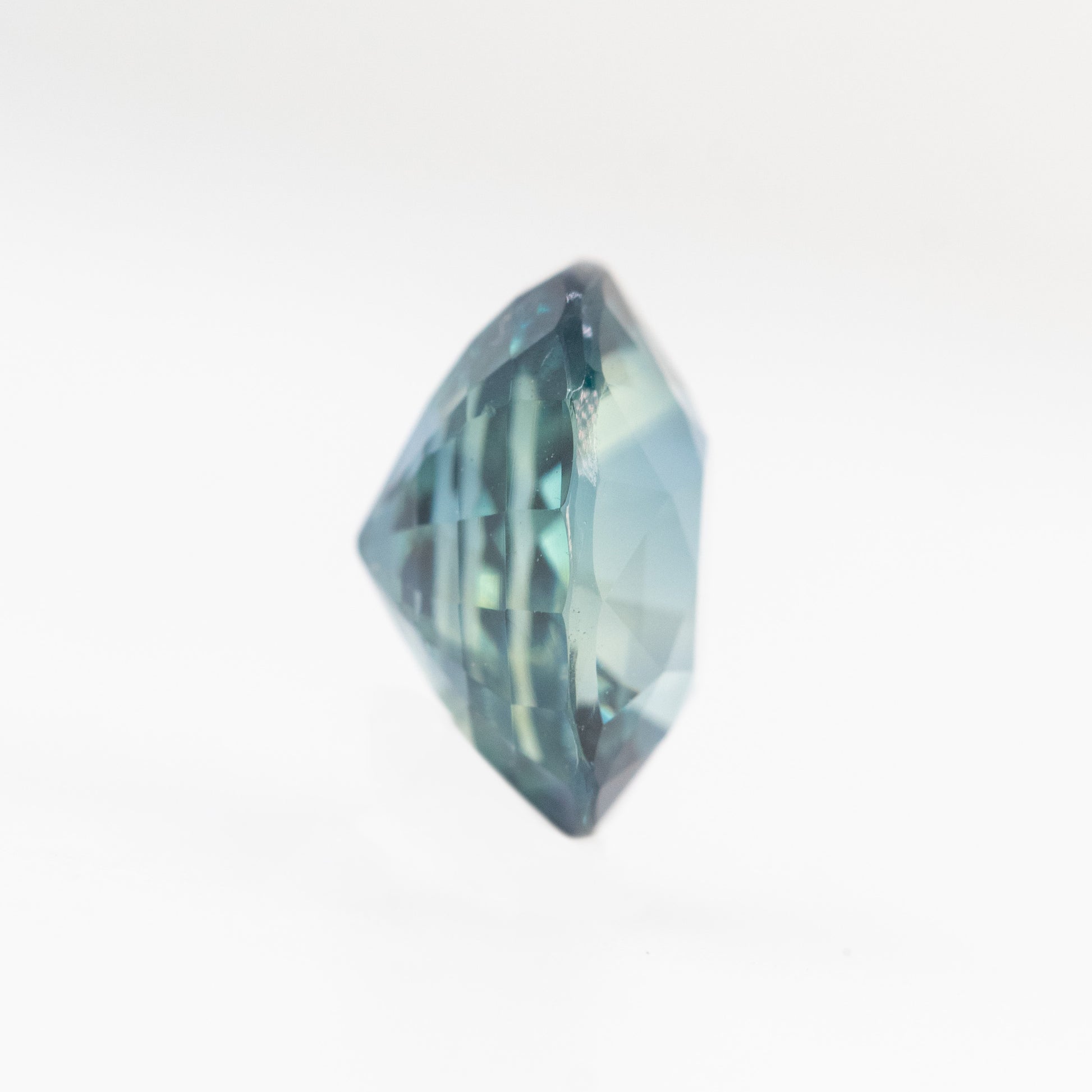 2.02 Carat Teal Blue Oval Sapphire for Custom Work - Inventory Code TBOS202 - Midwinter Co. Alternative Bridal Rings and Modern Fine Jewelry