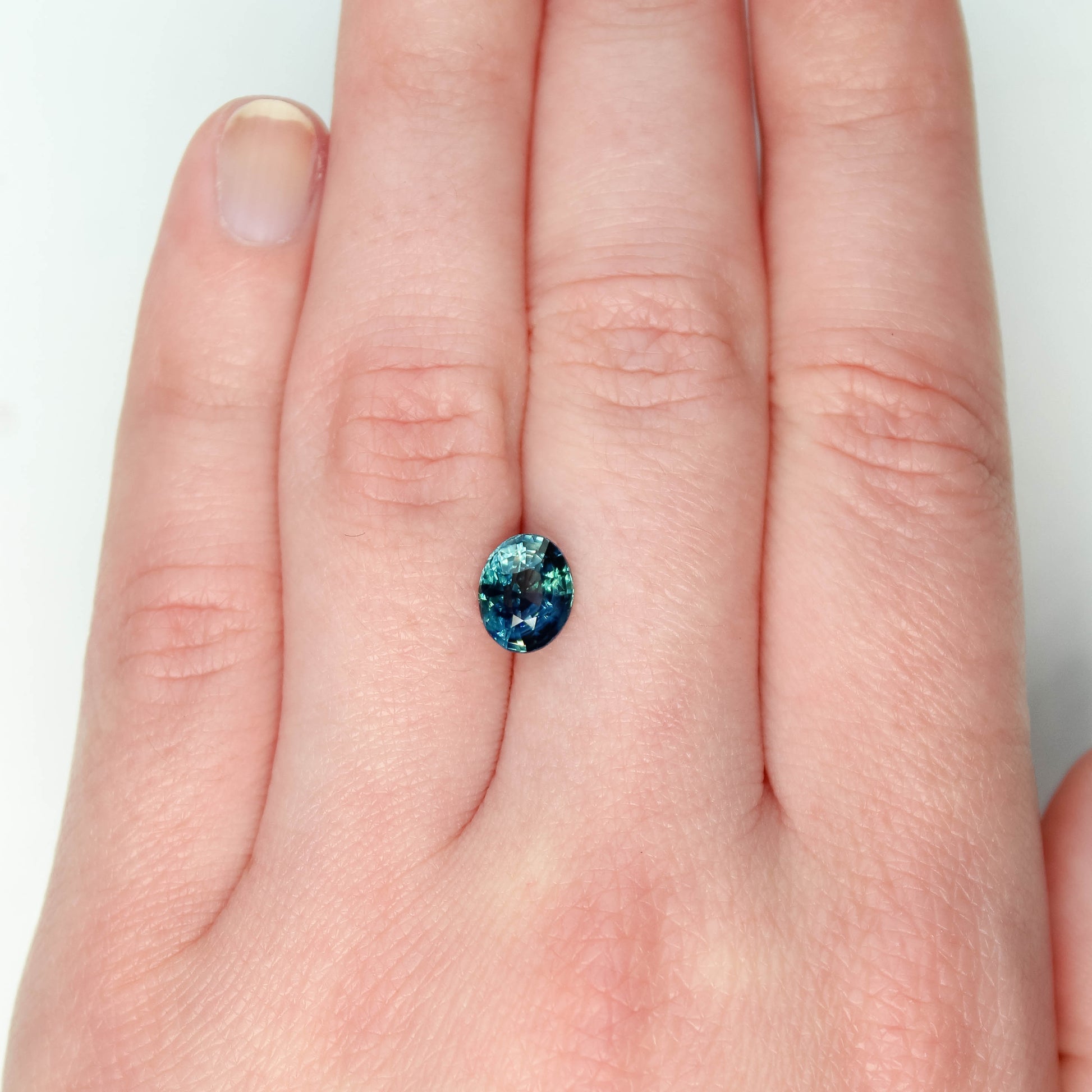 2.02 Carat Teal Blue Oval Sapphire for Custom Work - Inventory Code TBOS202 - Midwinter Co. Alternative Bridal Rings and Modern Fine Jewelry