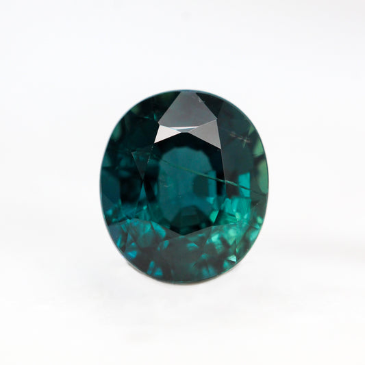 1.45 Carat Dark Teal Oval Sapphire for Custom Work - Inventory Code TOS145 - Midwinter Co. Alternative Bridal Rings and Modern Fine Jewelry