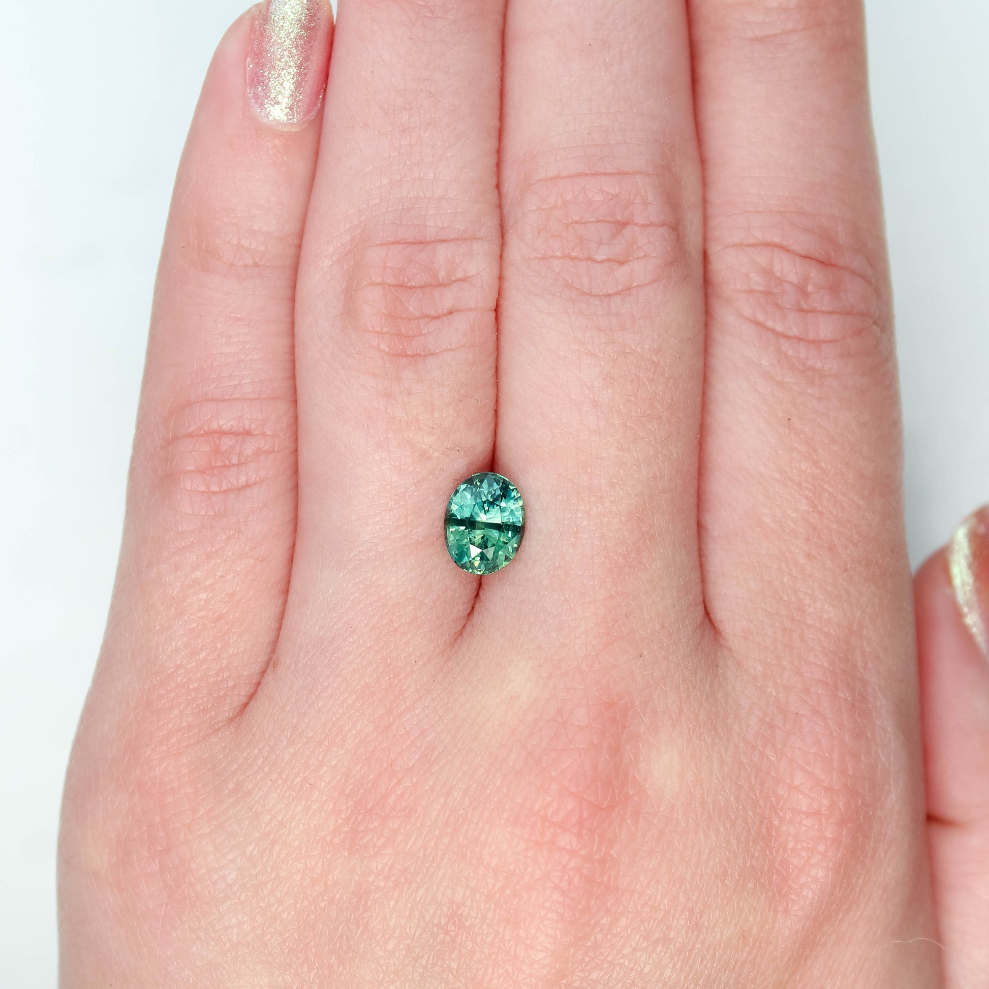 2.10 Carat Teal Oval Sapphire for Custom Work - Inventory Code TOS210 - Midwinter Co. Alternative Bridal Rings and Modern Fine Jewelry