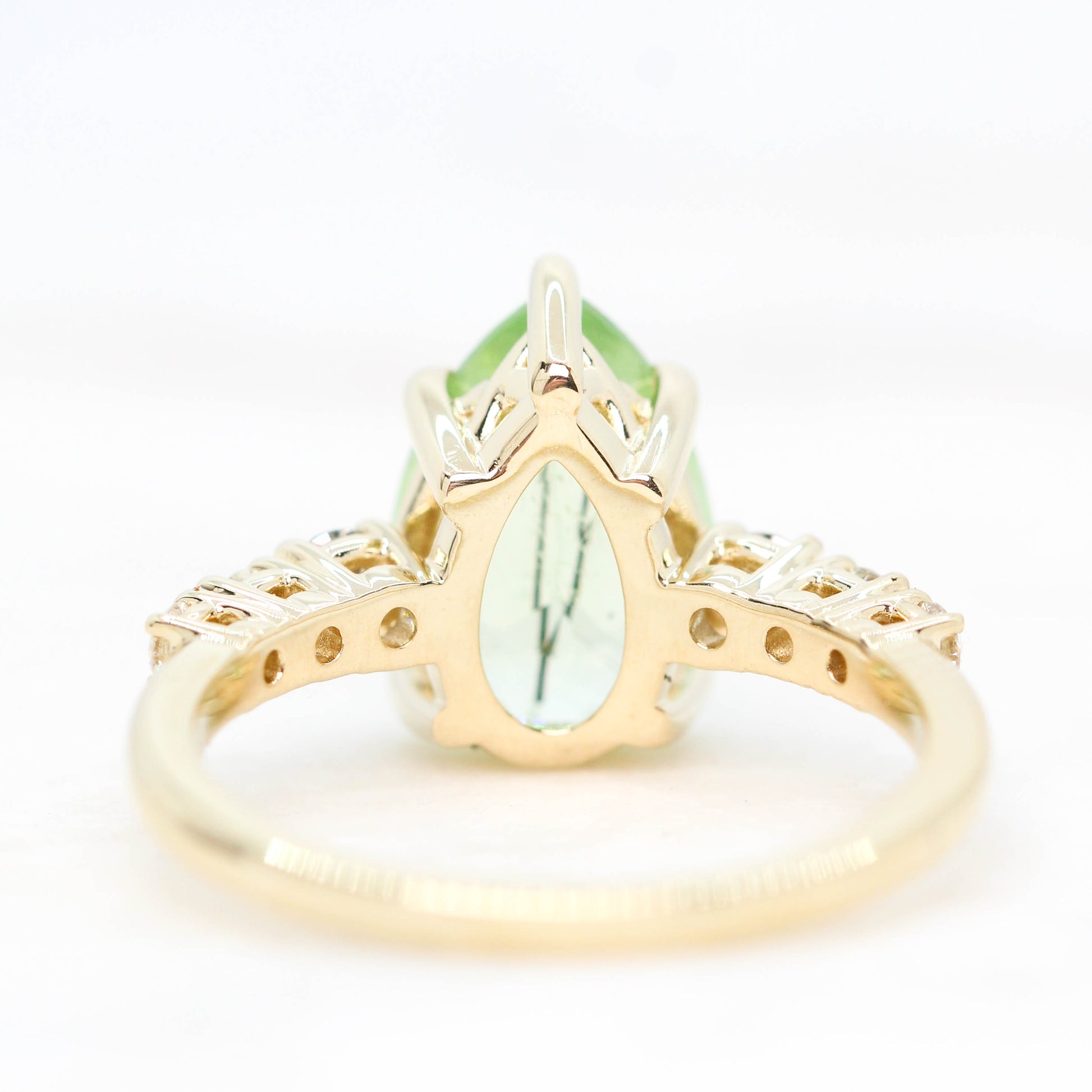 Tina Ring with a 2.58 Carat Light Green Pear Peridot and Gray and White Accent Diamonds in 14k Yellow Gold - Ready to Size and Ship - Midwinter Co. Alternative Bridal Rings and Modern Fine Jewelry
