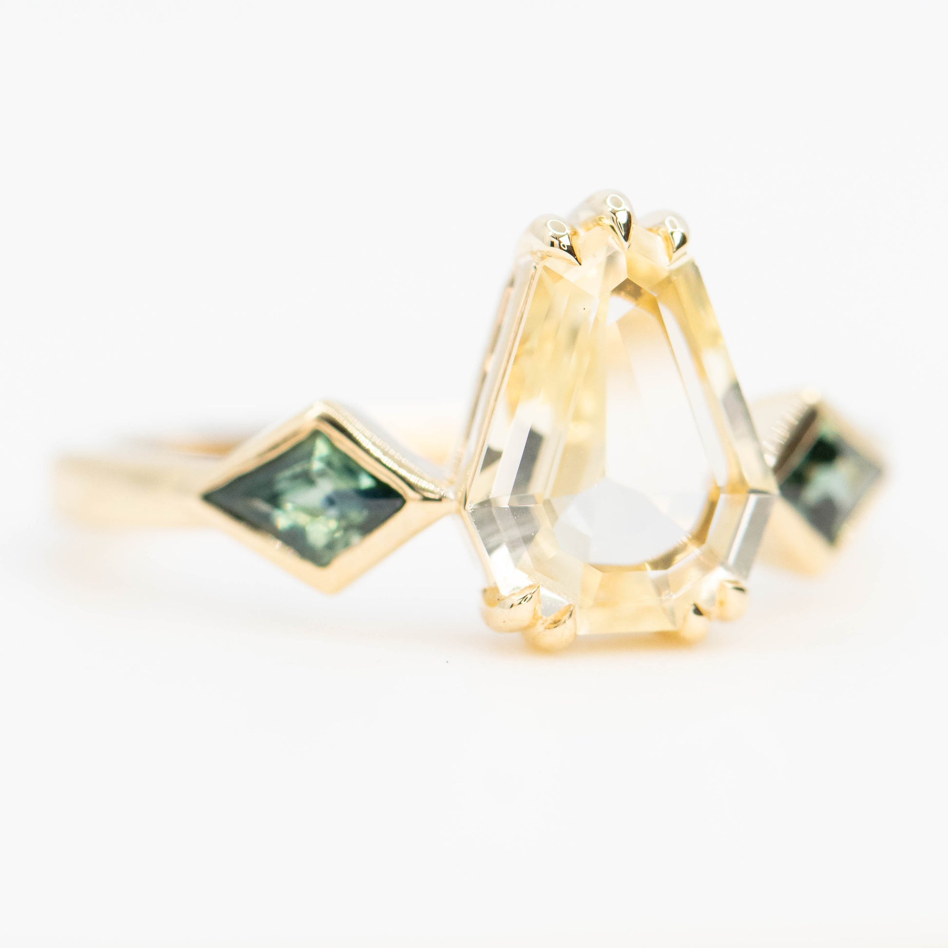Vespera Ring with a 1.74 Carat Clear Yellow Geometric Pear Sapphire and Teal Sapphire Accents in 14k Yellow Gold - Ready to Size and Ship - Midwinter Co. Alternative Bridal Rings and Modern Fine Jewelry