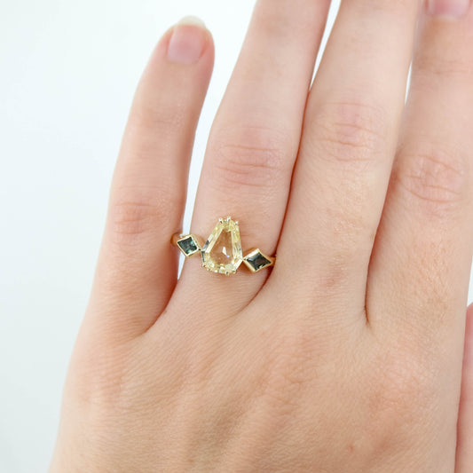 Vespera Ring with a 1.74 Carat Clear Yellow Geometric Pear Sapphire and Teal Sapphire Accents in 14k Yellow Gold - Ready to Size and Ship - Midwinter Co. Alternative Bridal Rings and Modern Fine Jewelry