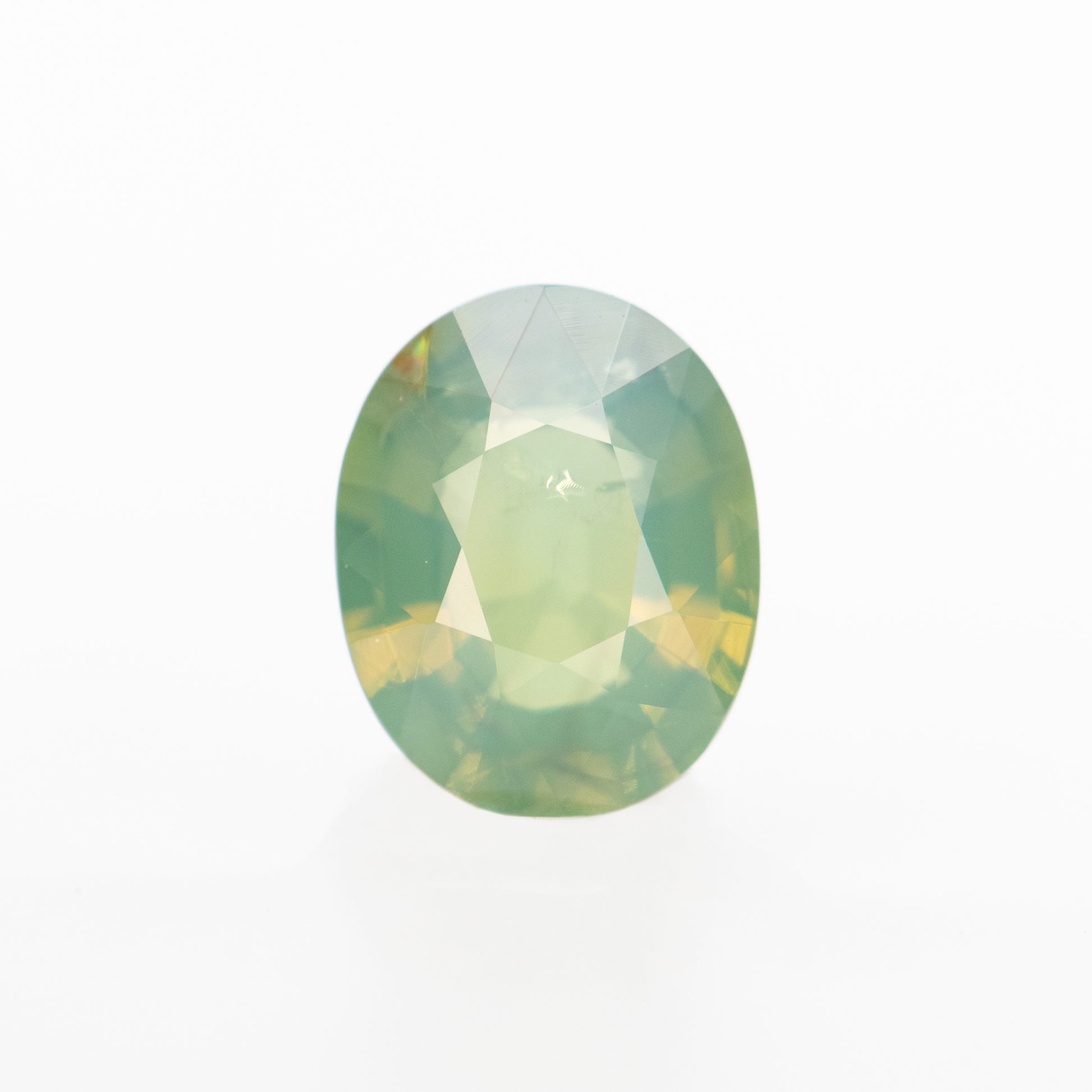 0.92 Carat Slightly Opalescent Yellow-Green Oval Sapphire for Custom Work - Inventory Code YGOS092 - Midwinter Co. Alternative Bridal Rings and Modern Fine Jewelry