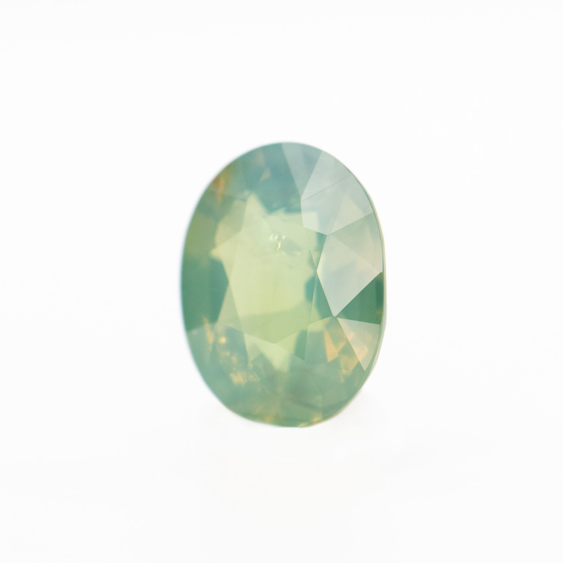 0.92 Carat Slightly Opalescent Yellow-Green Oval Sapphire for Custom Work - Inventory Code YGOS092 - Midwinter Co. Alternative Bridal Rings and Modern Fine Jewelry
