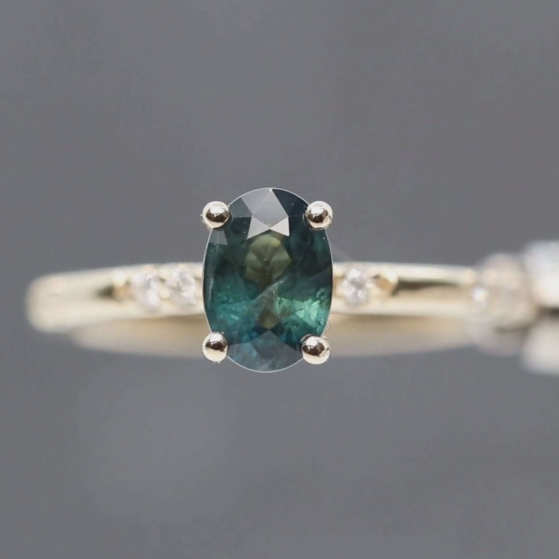 Estelle Ring with a 1.03 Carat Teal Oval Sapphire and White Accent Diamonds in 14k Yellow Gold - Ready to Size and Ship