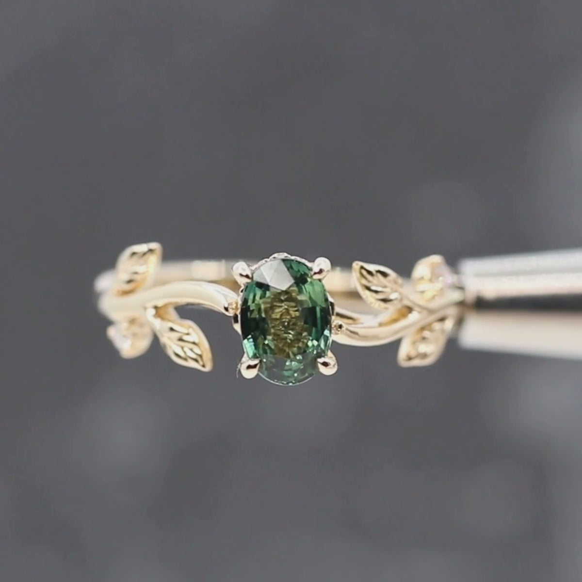 Vinia Ring with a 1.04 Carat Teal Oval Sapphire and White Accent and Hidden Diamonds in 14k Yellow Gold - Ready to Size and Ship