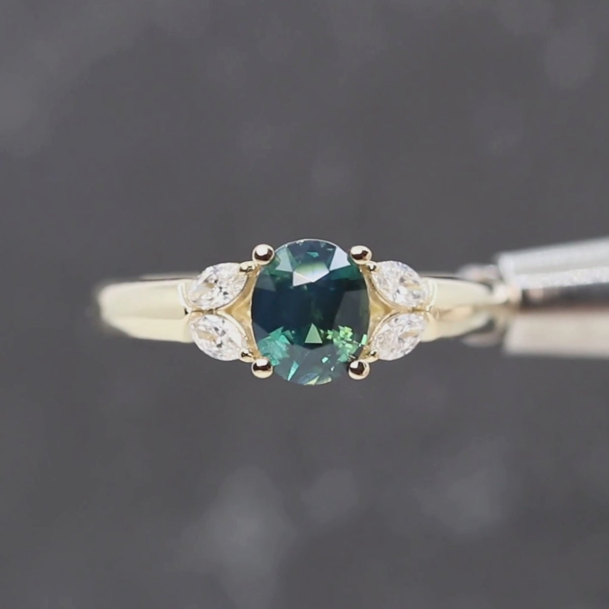 Marisol Ring with a 1.16 Carat Teal Oval Sapphire and White Accent Diamonds in 14k Yellow Gold - Ready to Size and Ship